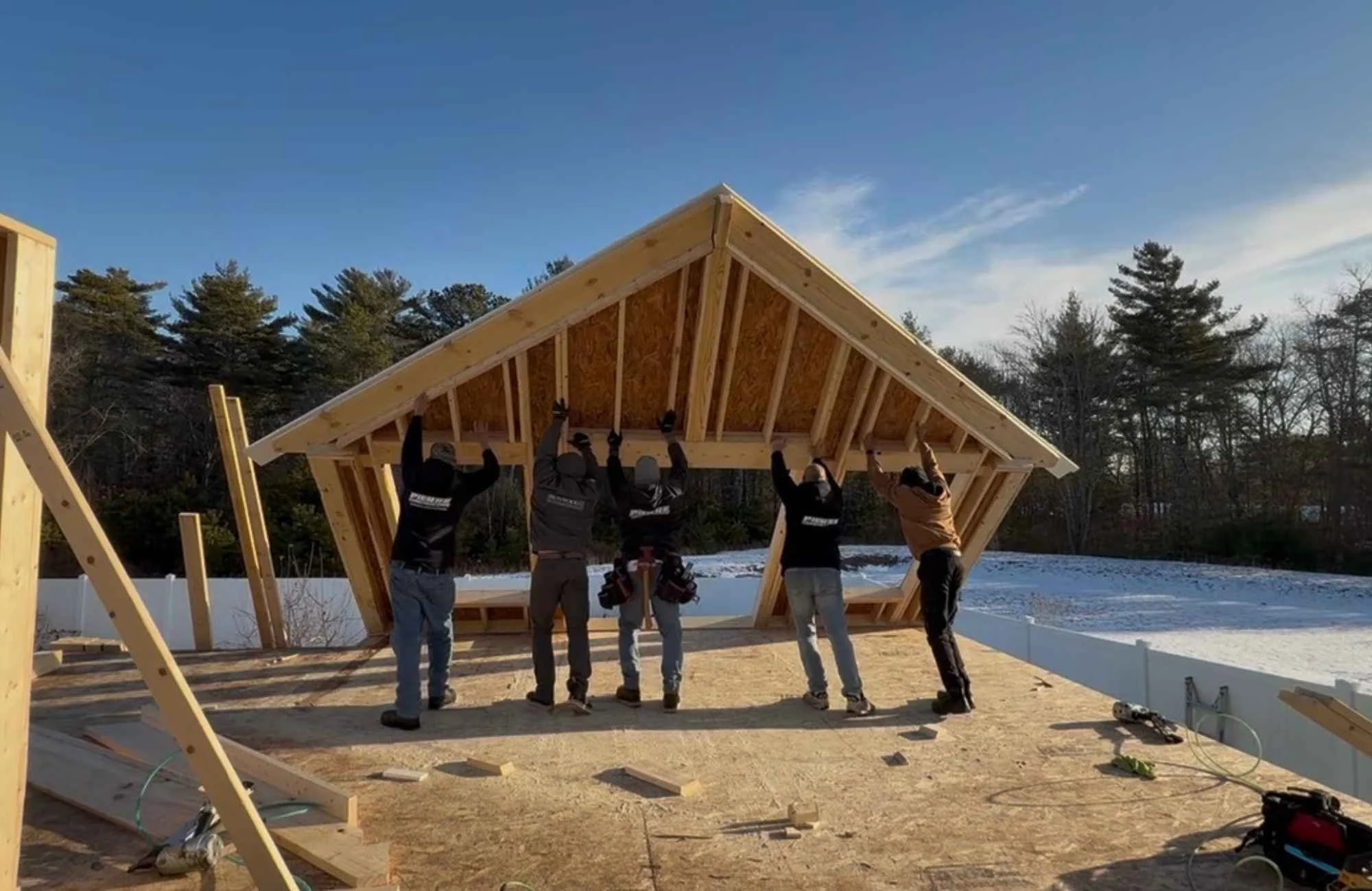 ironwood-studio-new-england-designer-trade-relationships-construction-team-raising-house-framing-new-build-home-timeless-residential-design.jpg