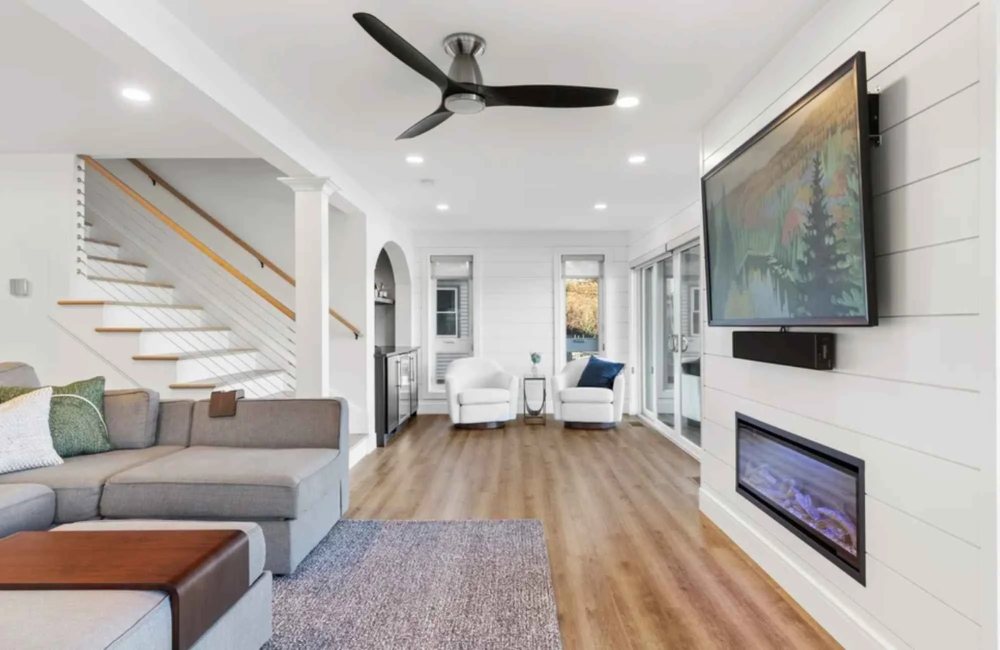 full-service-interior-design-cape-cod-ma-renovate-or-build-new-home-living-room-shiplap-wall-with-fireplace-and-tv-gray-sectional-coastal-design.jpg