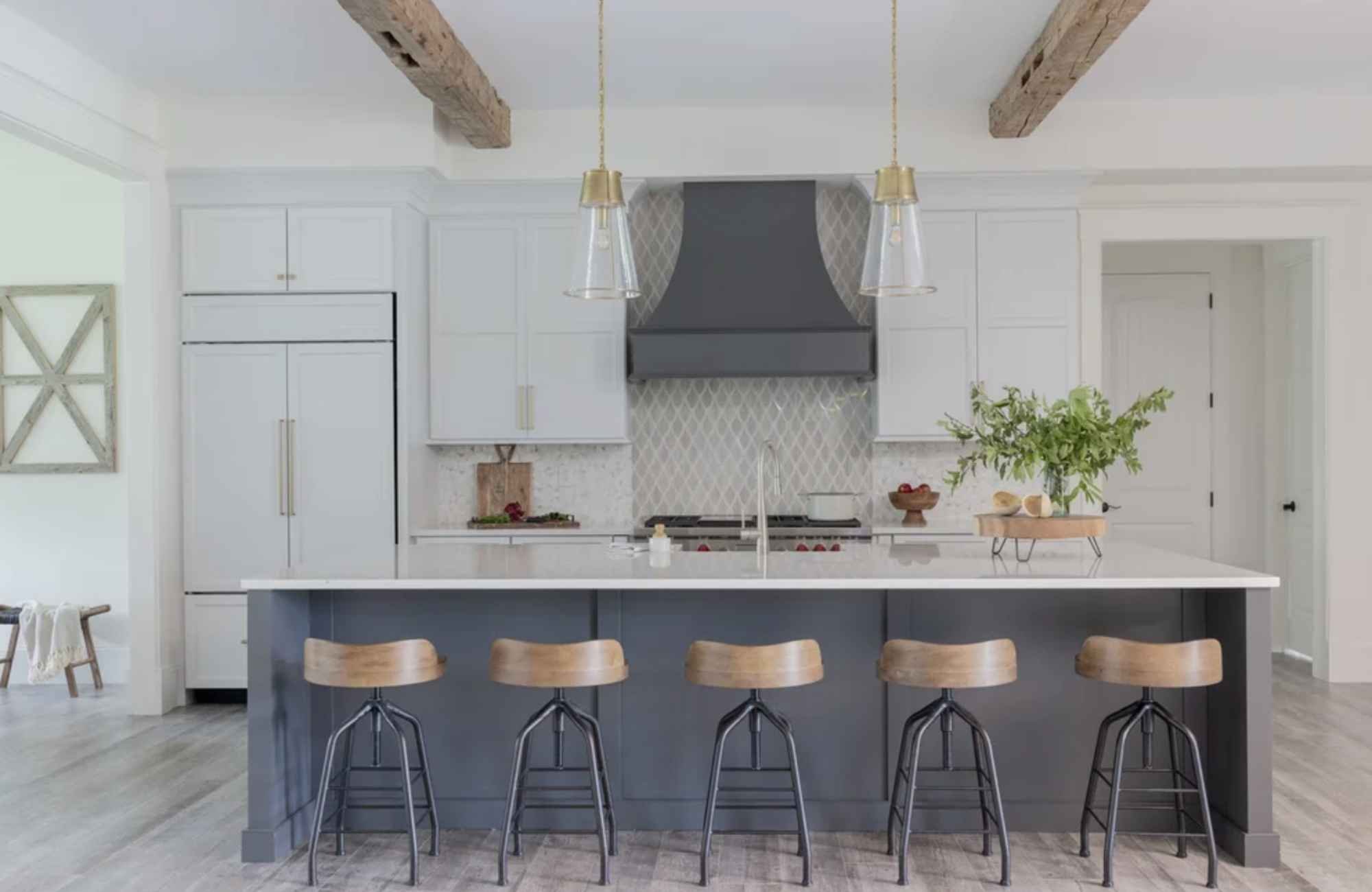 full-service-interior-design-cape-cod-ma-full-gut-renovation-new-kitchen-large-island-blue-and-white-cabinets-wood-ceiling-beams-custom-range-hood.jpg