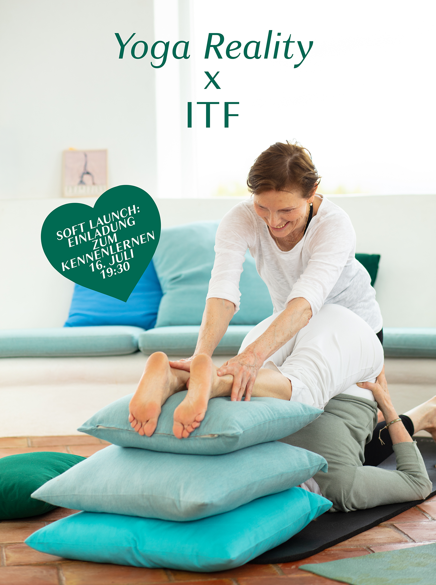 A woman practicing yoga while receiving a massage from an instructor in a wellness setting with stacked pillows and a bright, airy background.
