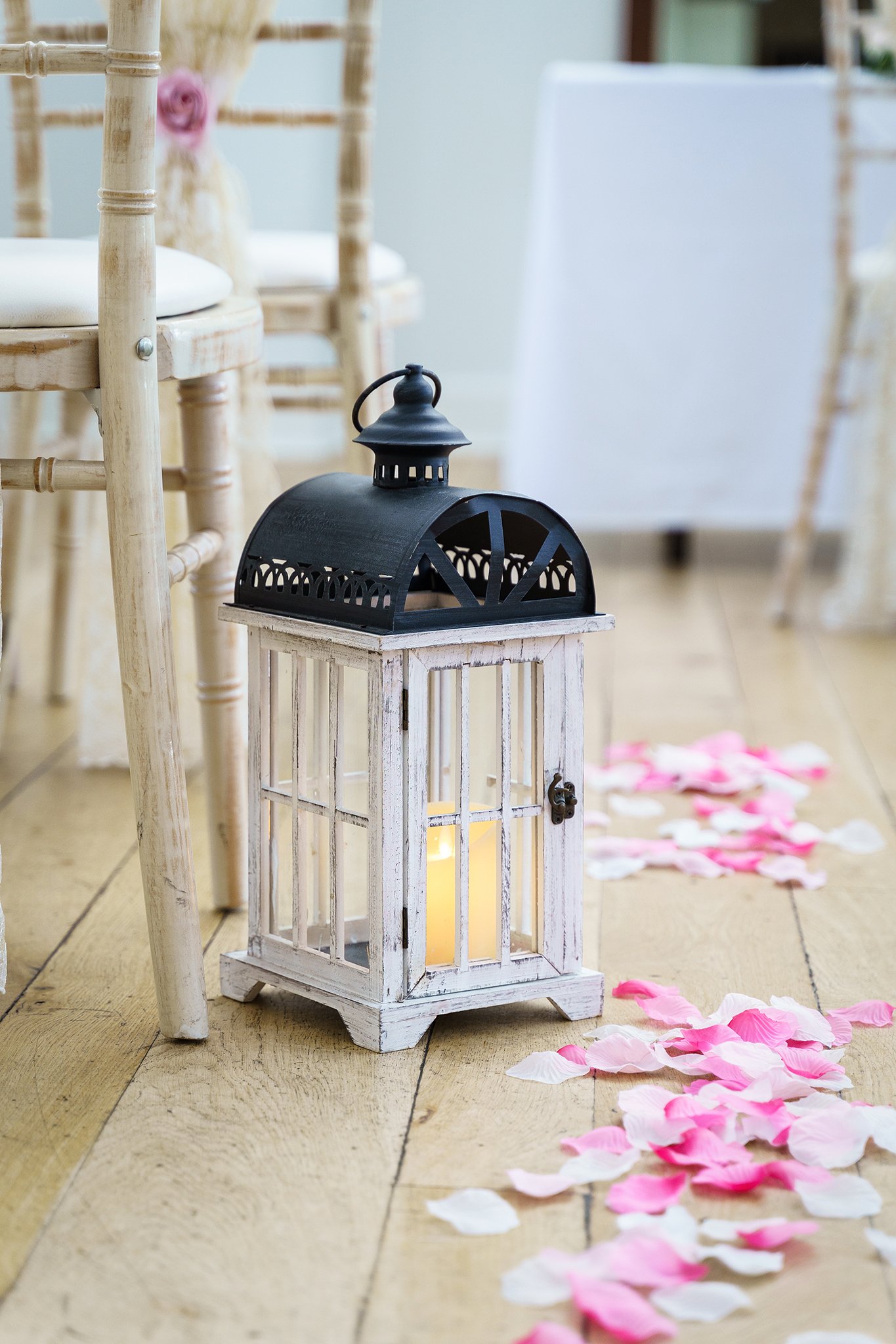 Details of a lantern in a room at Hadley Park House Hotel in Telford set up for a wedding ceremony