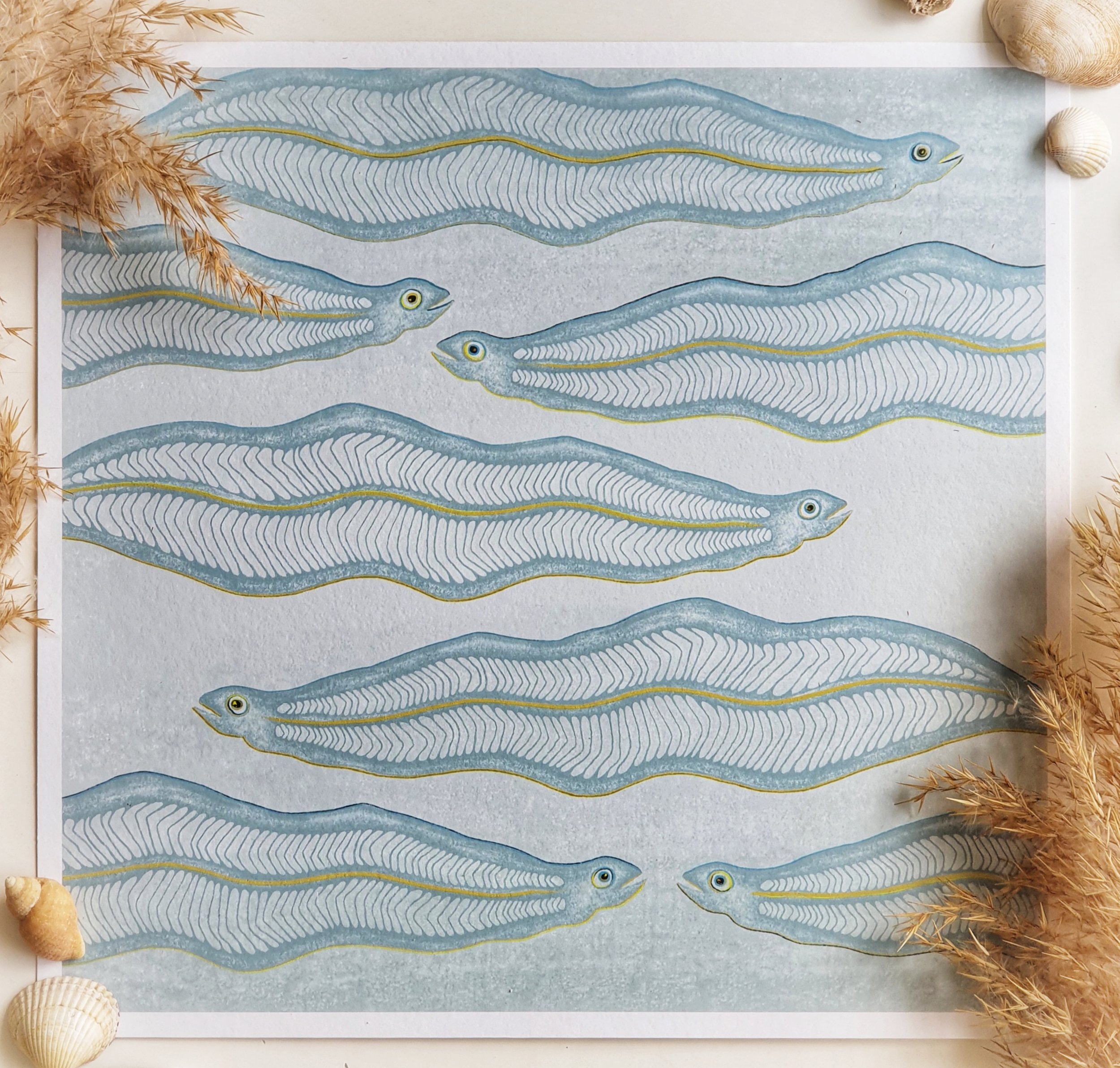 Leaf-shaped, transparent, eel larvae depicted in soft turquoise and yellow are arranged in a pattern across a pale turquoise background.