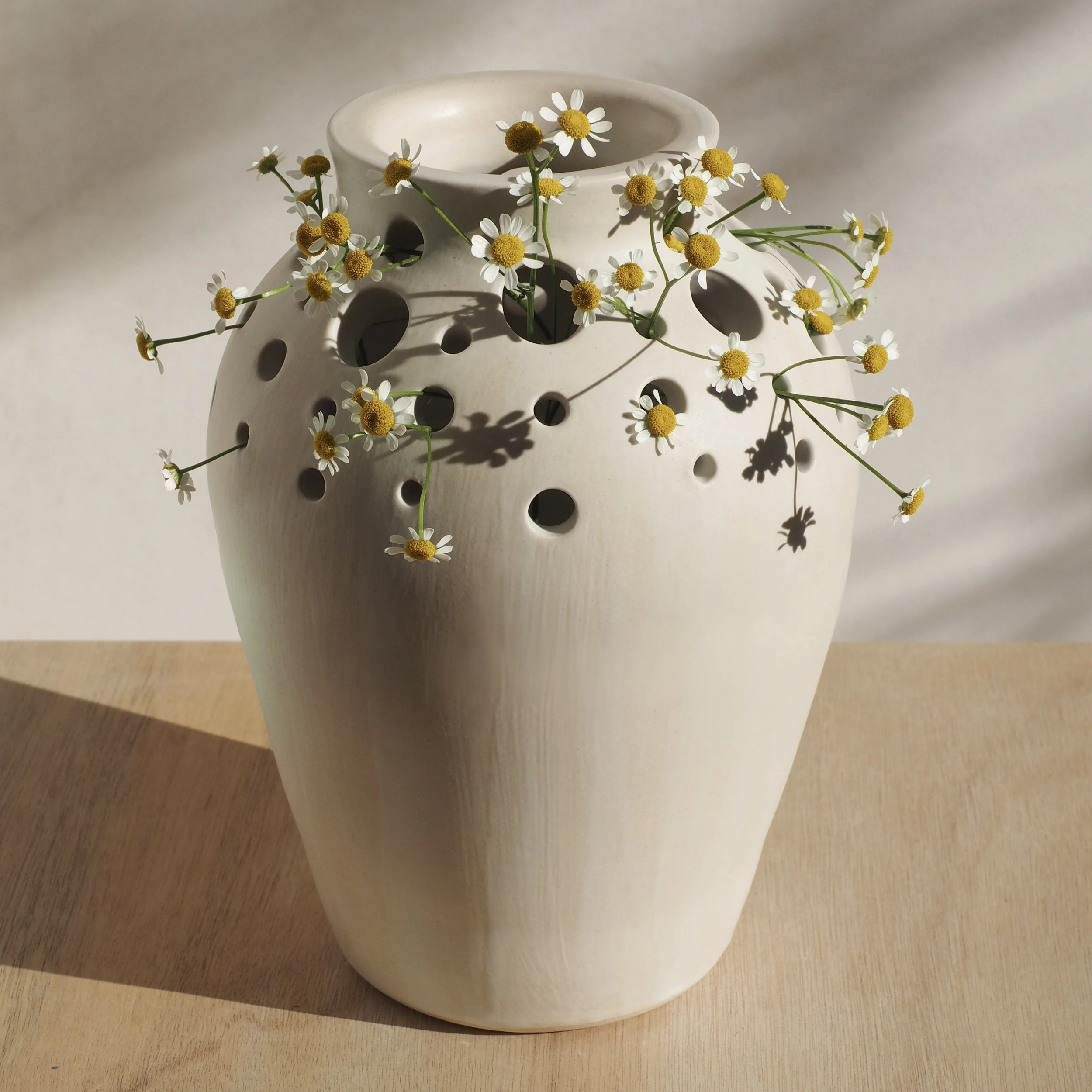 WHITE HOLE VASE 1STDIBS.jpg