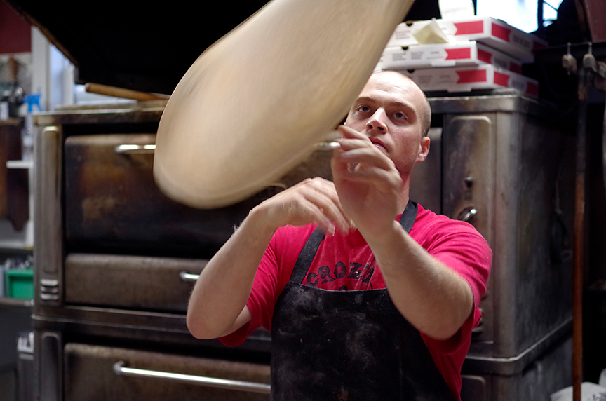  chef tossing pizza dough 