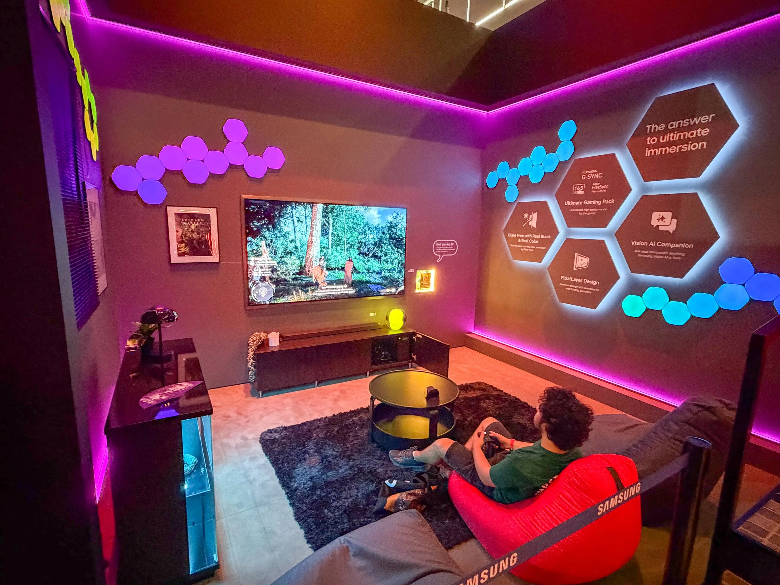 Gamescom 2026 accessible gaming setup with a seated player using a controller in a spacious, lounge-style environment designed for comfortable play