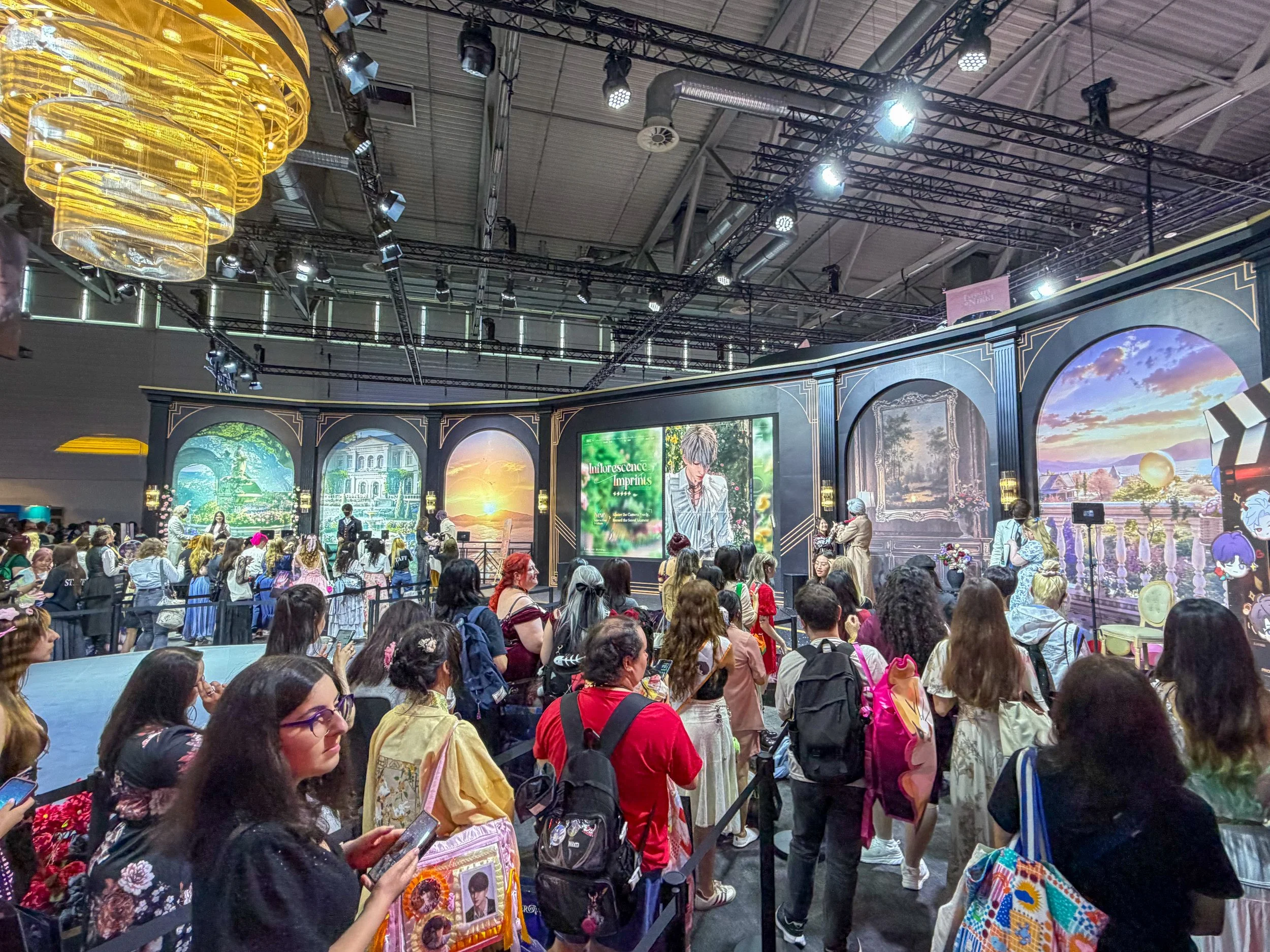 Love and Deepspace fan experience at Gamescom 2026, with visitors gathered around character displays and cosplay performers