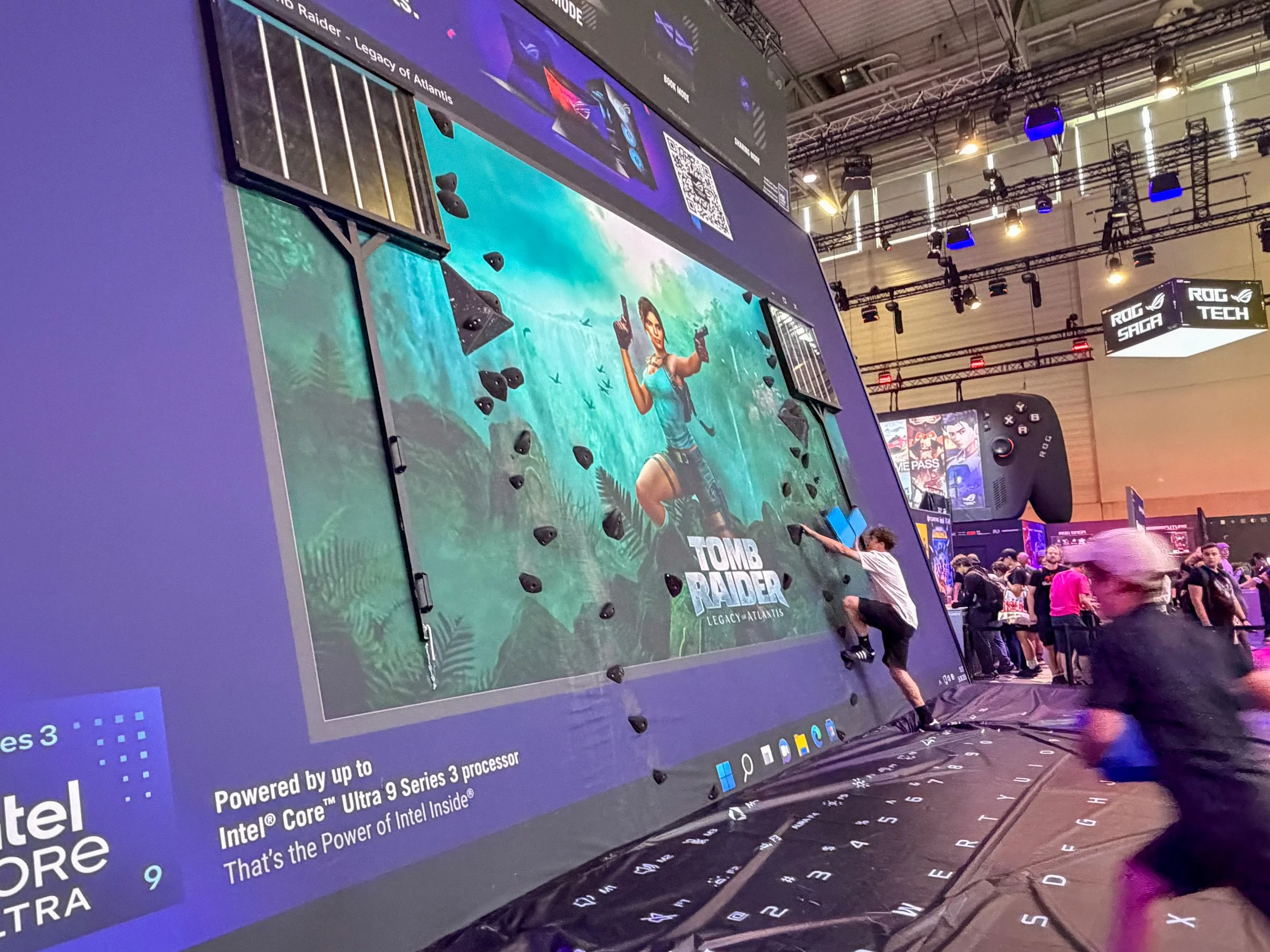 Tomb Raider: Legacy of Atlantis climbing wall challenge at Gamescom 2026, with a visitor taking part in the live activation