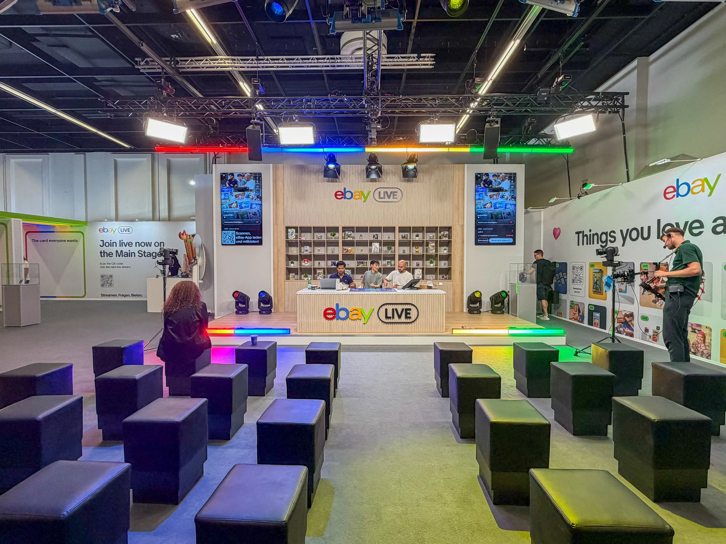 eBay Live stage at Gamescom 2026, set up for live buying and selling of gaming collectibles to audiences on site and online