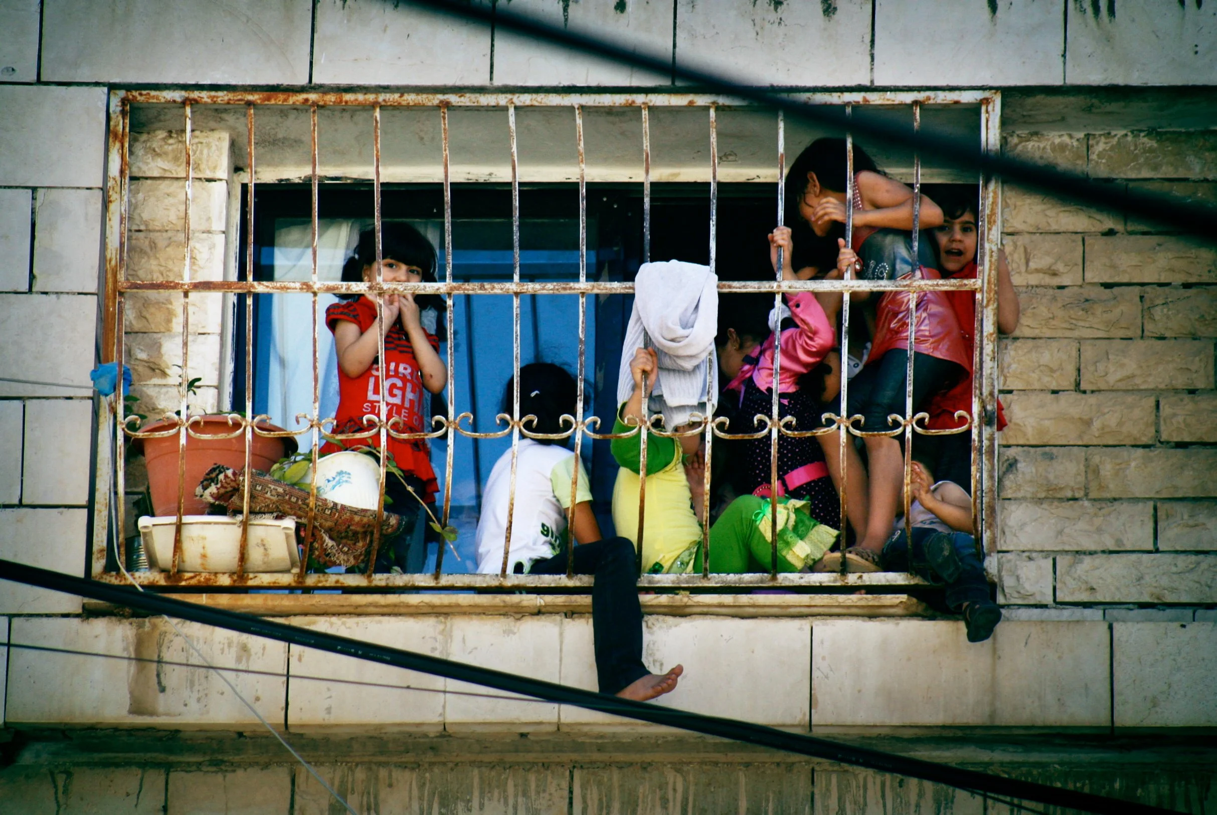 kids in window copy.jpg