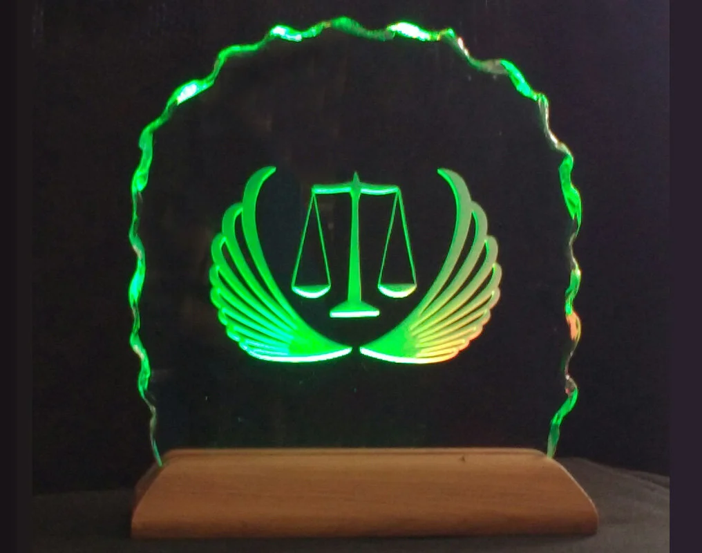 legal-logo-etched-in-glass-moodlight-illluminated-green.jpg