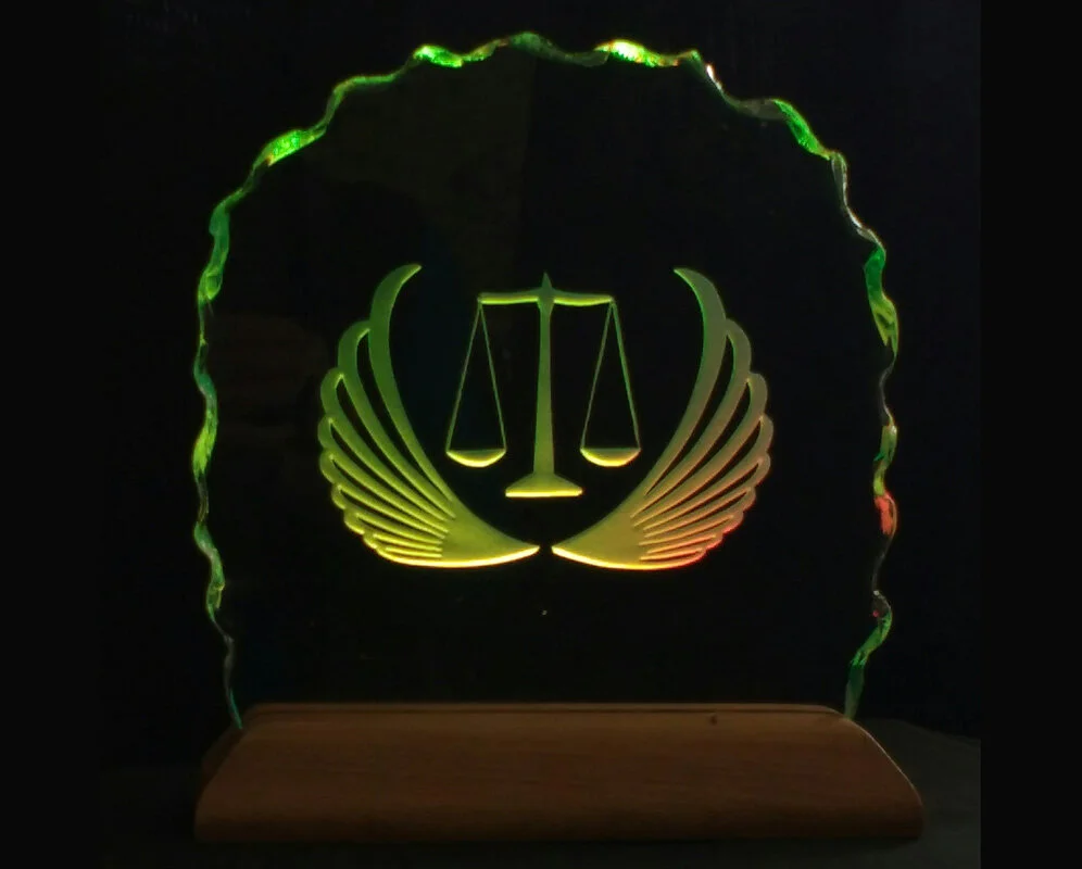 legal-logo-etched-in-glass-moodlight-illuminated-yellow-green.jpg