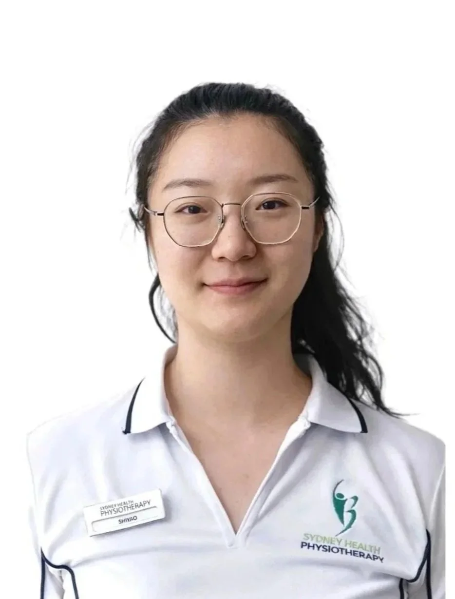 asian female with black hair and white polo
