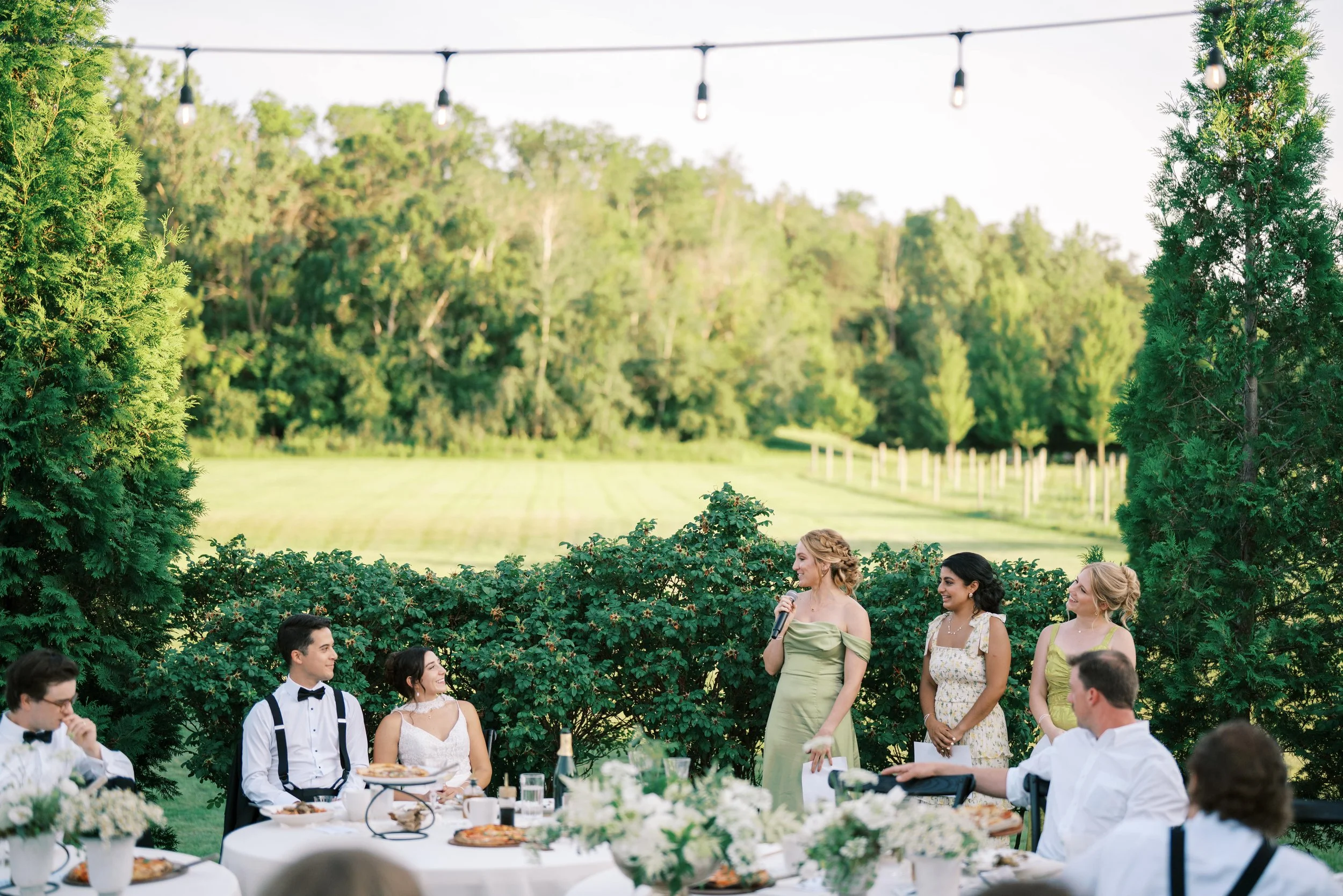 A family-style dinner in the vineyard. Ceremony in the vineyard at Belle Ame. Planned and designed by HappiLily Events. Photographed by Lauren Page.