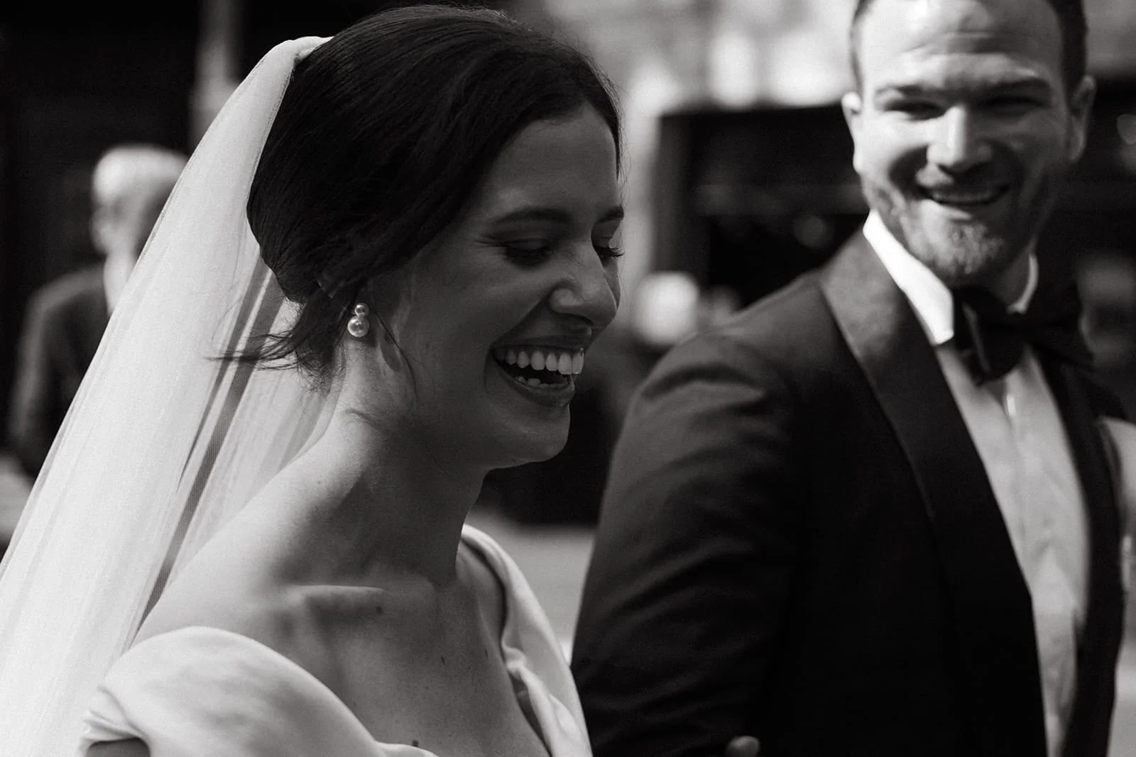 Newlyweds in black and white at Pinewood, a woodsy northern Minnesota wedding venue.