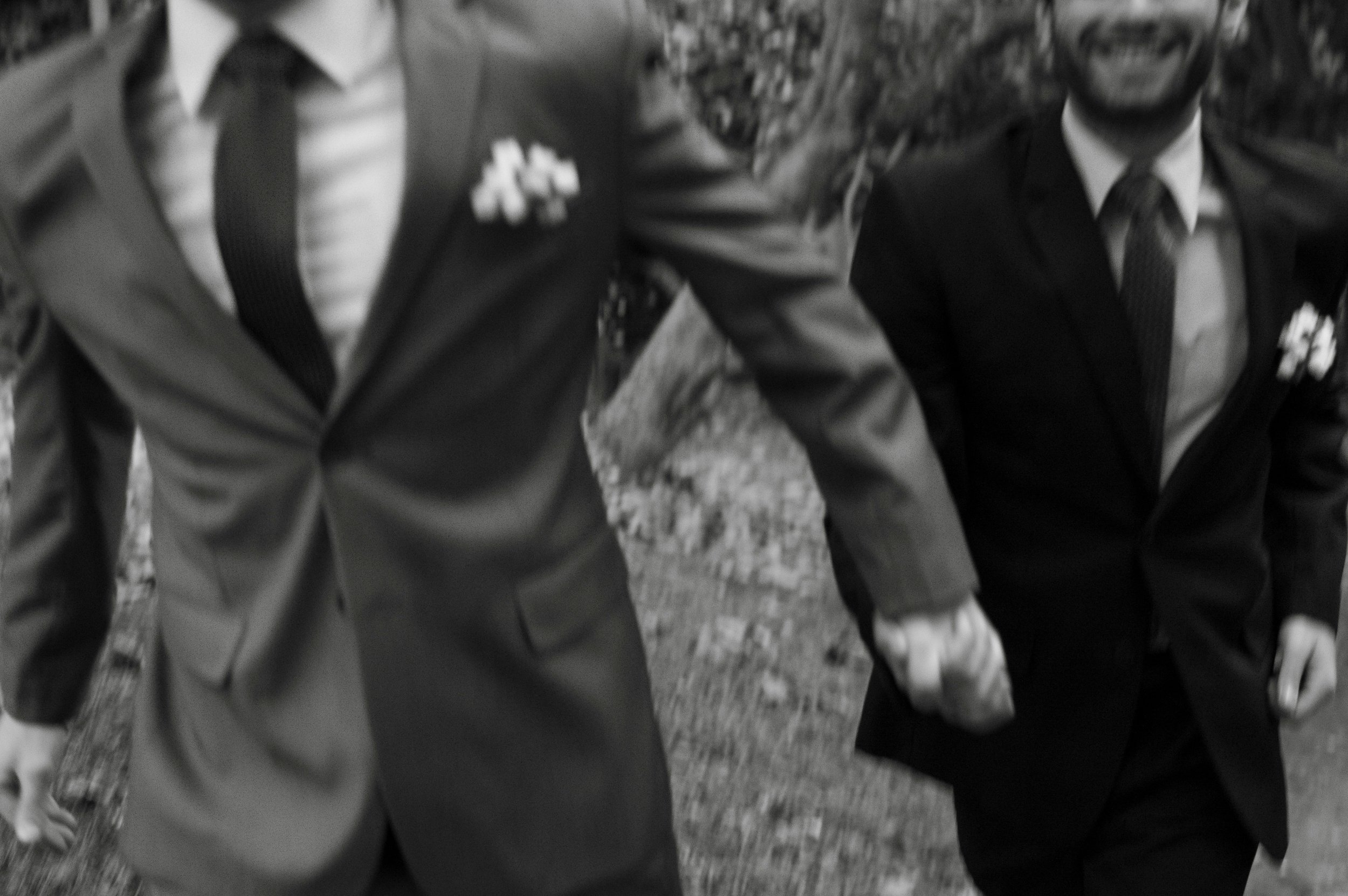 Two grooms on their wedding day in black and white, from an LQBTQ+ affirming wedding planner in Minneapolis.