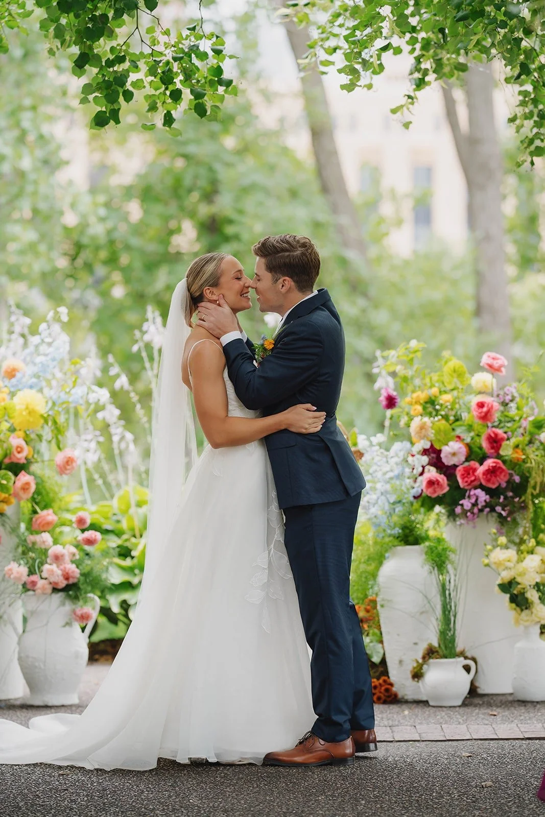 A colorful wedding ceremony at Nicollet Island Pavilion, photographed by Maddie Van Photography.