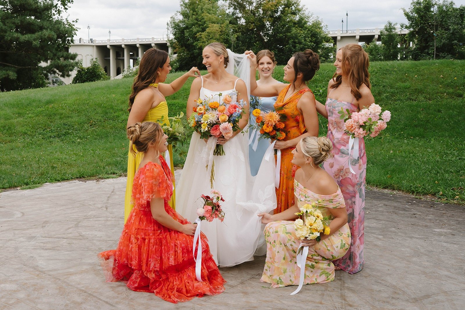 A colorful wedding ceremony at Nicollet Island Pavilion, photographed by Maddie Van Photography.