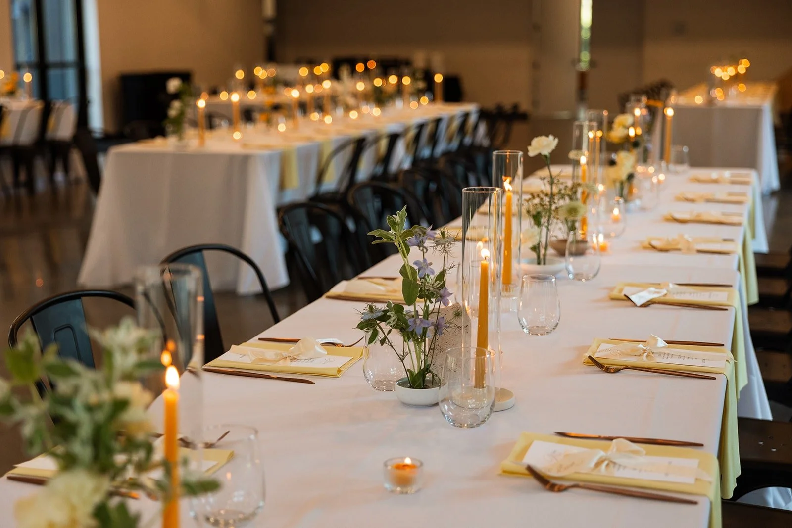A delicate butter yellow wedding at Pinewood in Cambridge, Minnesota. Photographed by Ali Miller