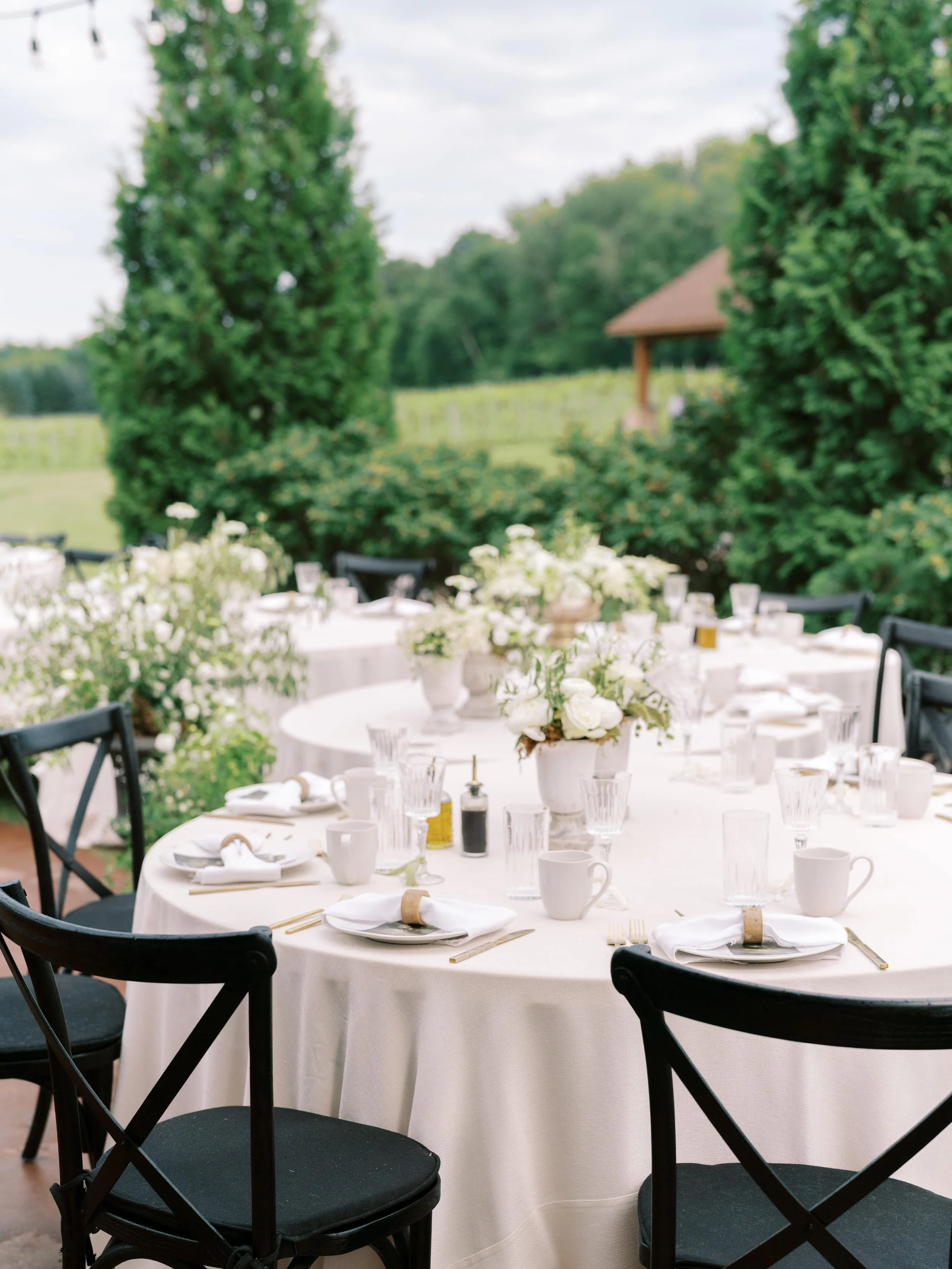 A family-style dinner in the vineyard. Ceremony in the vineyard at Belle Ame. Planned and designed by HappiLily Events. Photographed by Lauren Page.