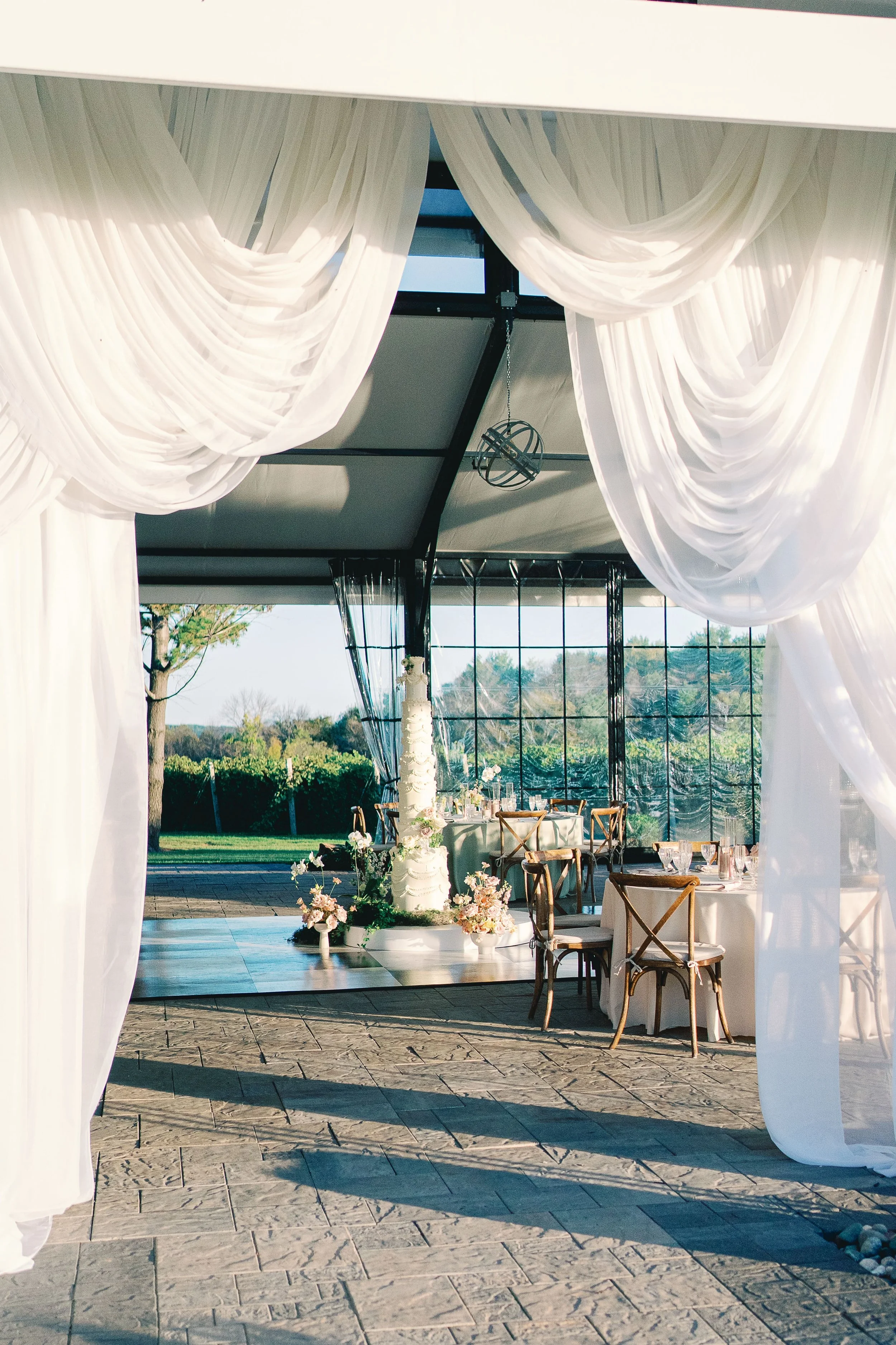 Luxury tent wedding reception in northern Minnesota, designed by HappiLily Events, photographed by Rachel Elle.