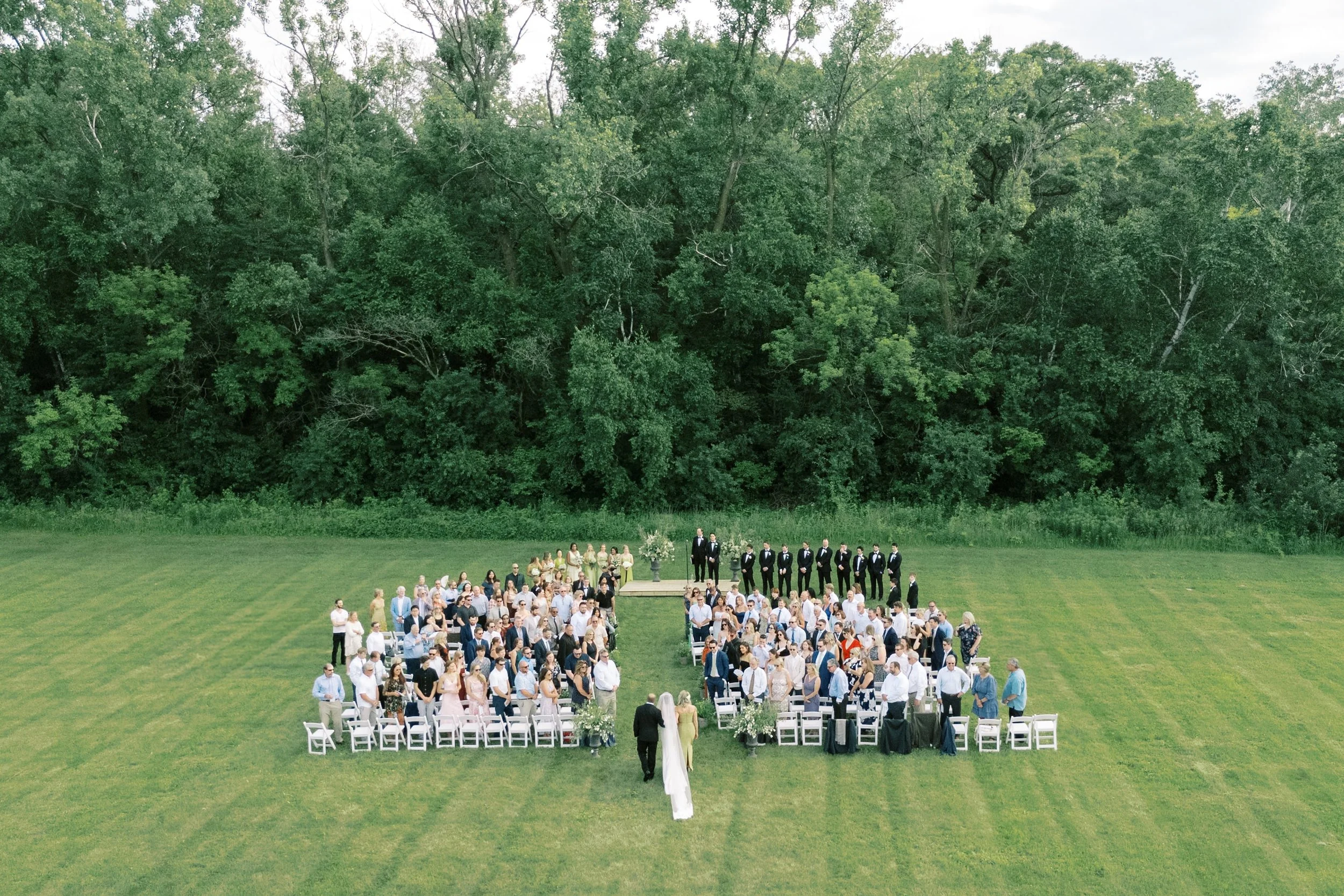 Ceremony in the vineyard at Belle Ame. Planned and designed by HappiLily Events. Photographed by Lauren Page.