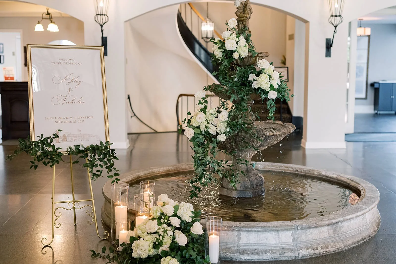 Statement florals in the entry fountain at the Lafayette Club