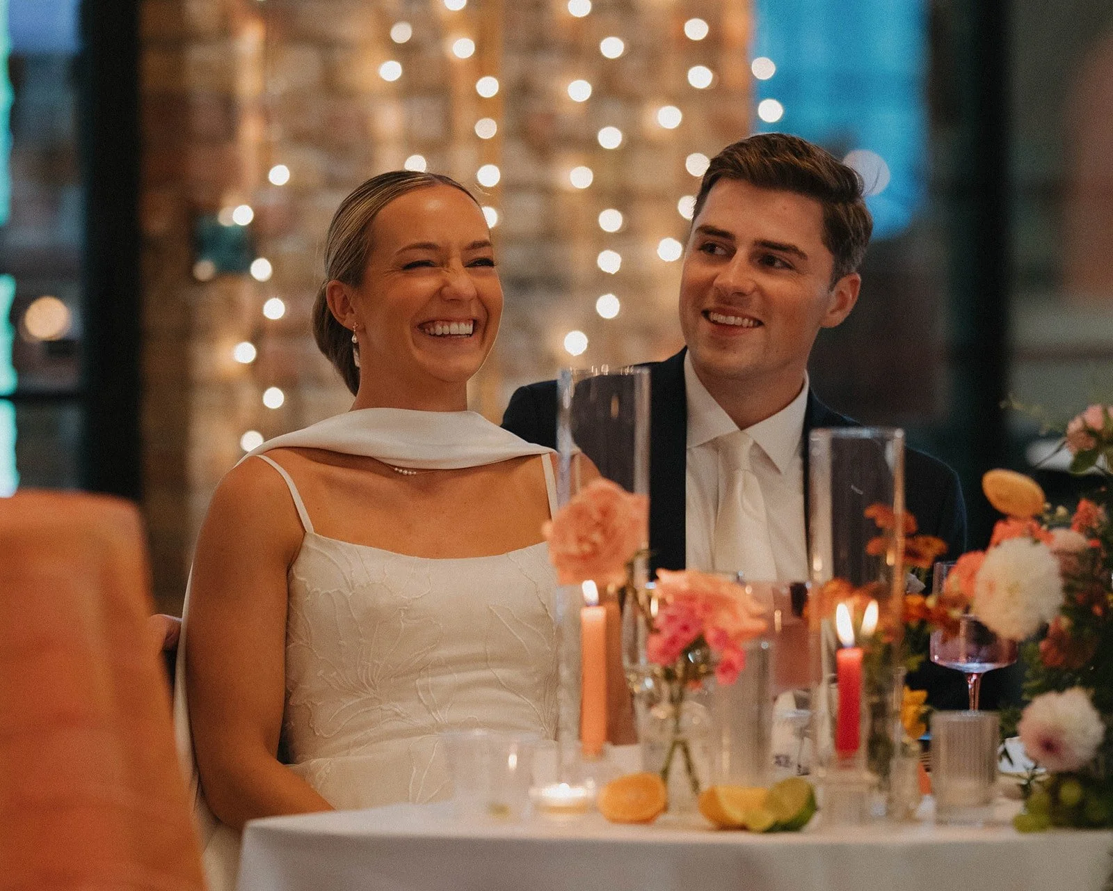A colorful wedding reception at Nicollet Island Pavilion, photographed by Maddie Van