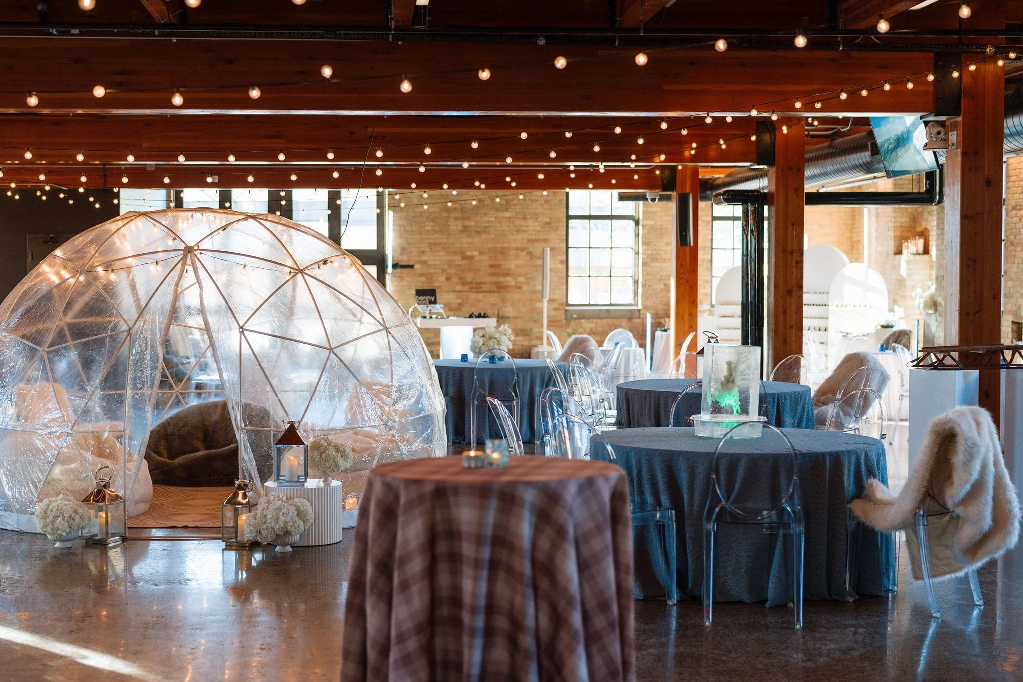 Winter party set with an igloo lounge at The Essence Event Center