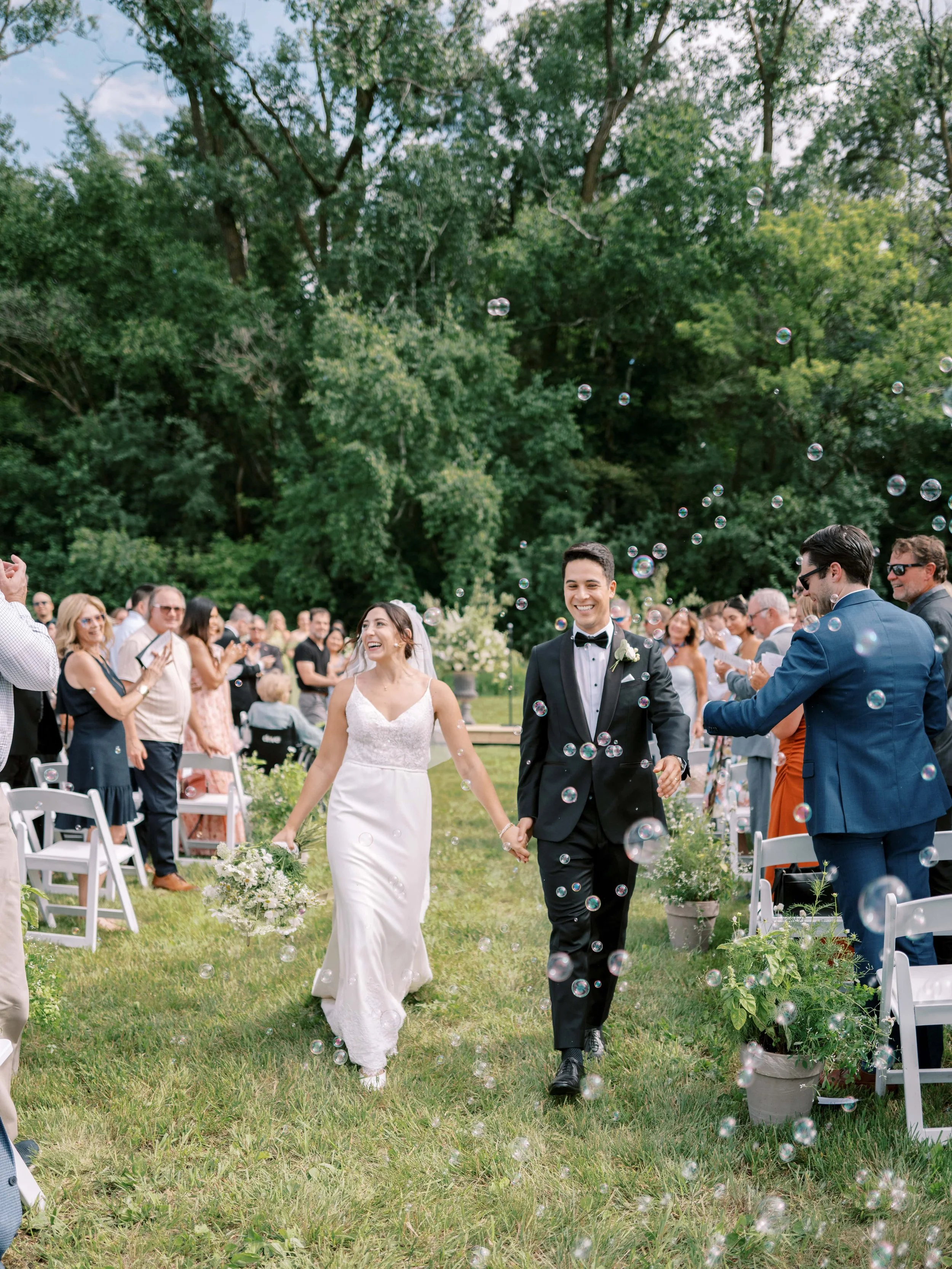 Ceremony in the vineyard at Belle Ame. Planned and designed by HappiLily Events. Photographed by Lauren Page.