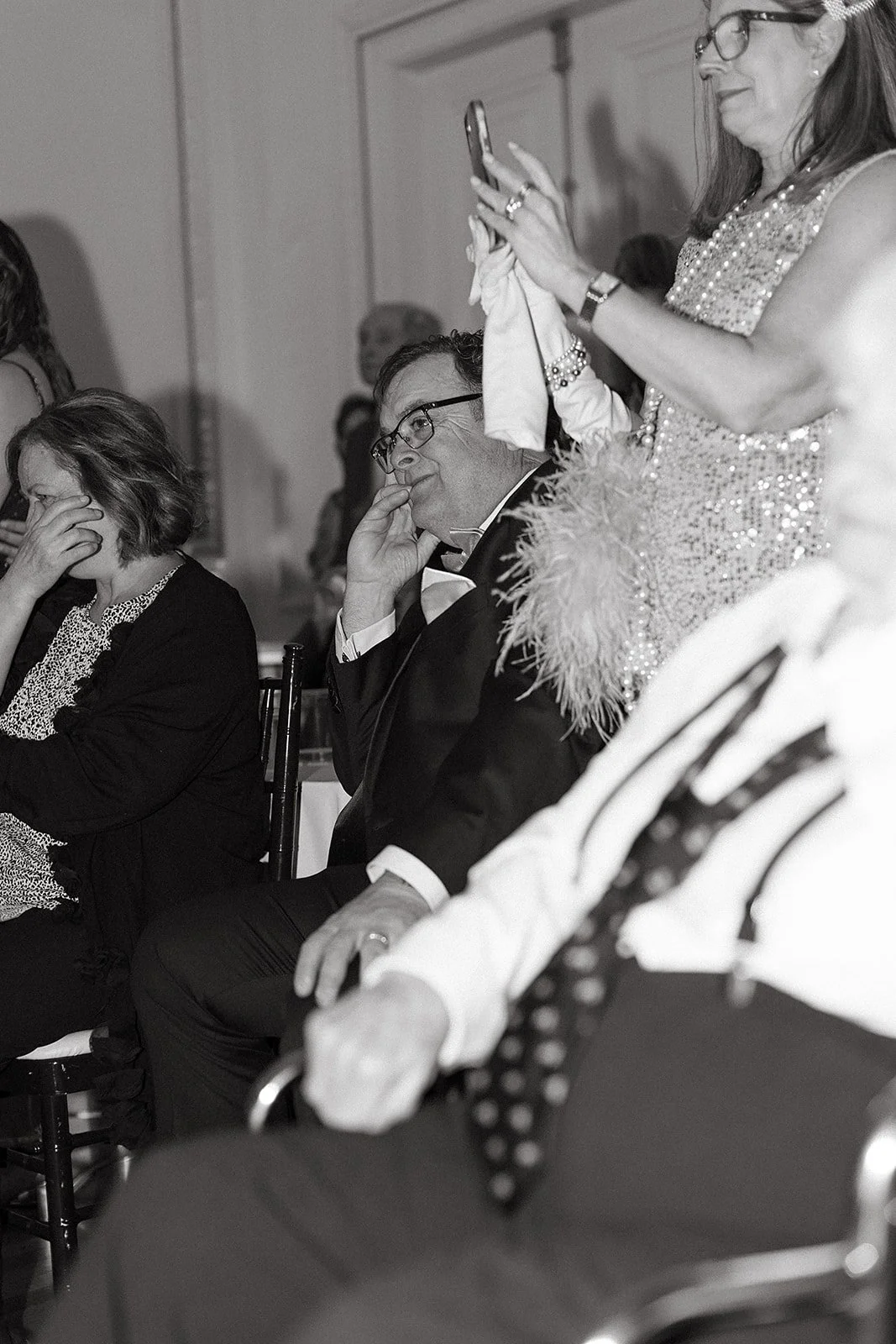 Guests celebrating during a joyful wedding reception at Tupper Manor