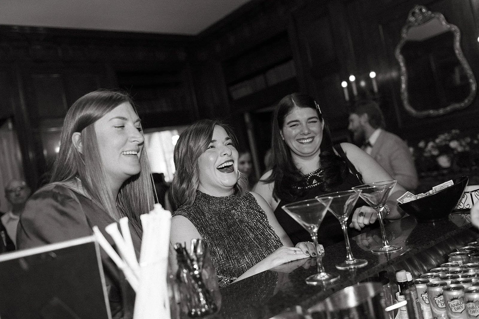 Guests celebrating during a joyful wedding reception at Tupper Manor