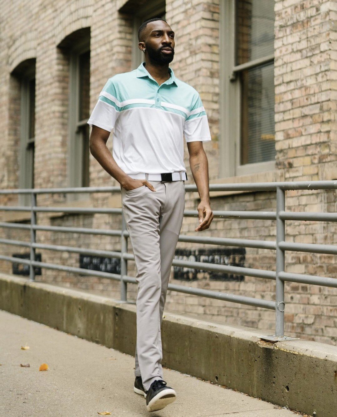 Looking cool and confident is easy with this lightweight, quick-drying polo. We paired classic white with a pop of vibrant turquoise for a contrasting design that&rsquo;s fresh and unique.

The silky, sweat-wicking fabric offers the ease of generous 