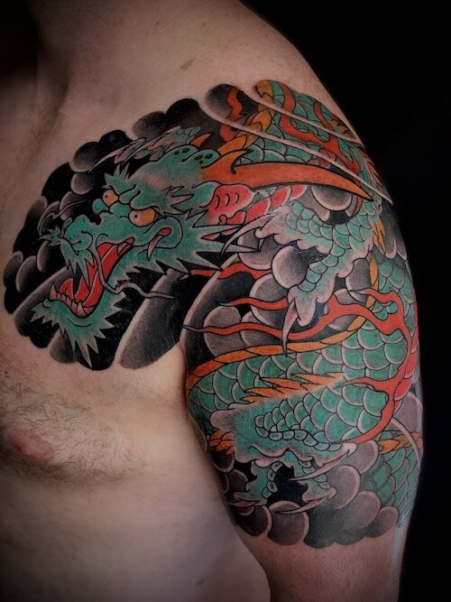 60 Best Dragon Tattoo to Show Your Strength in 2023