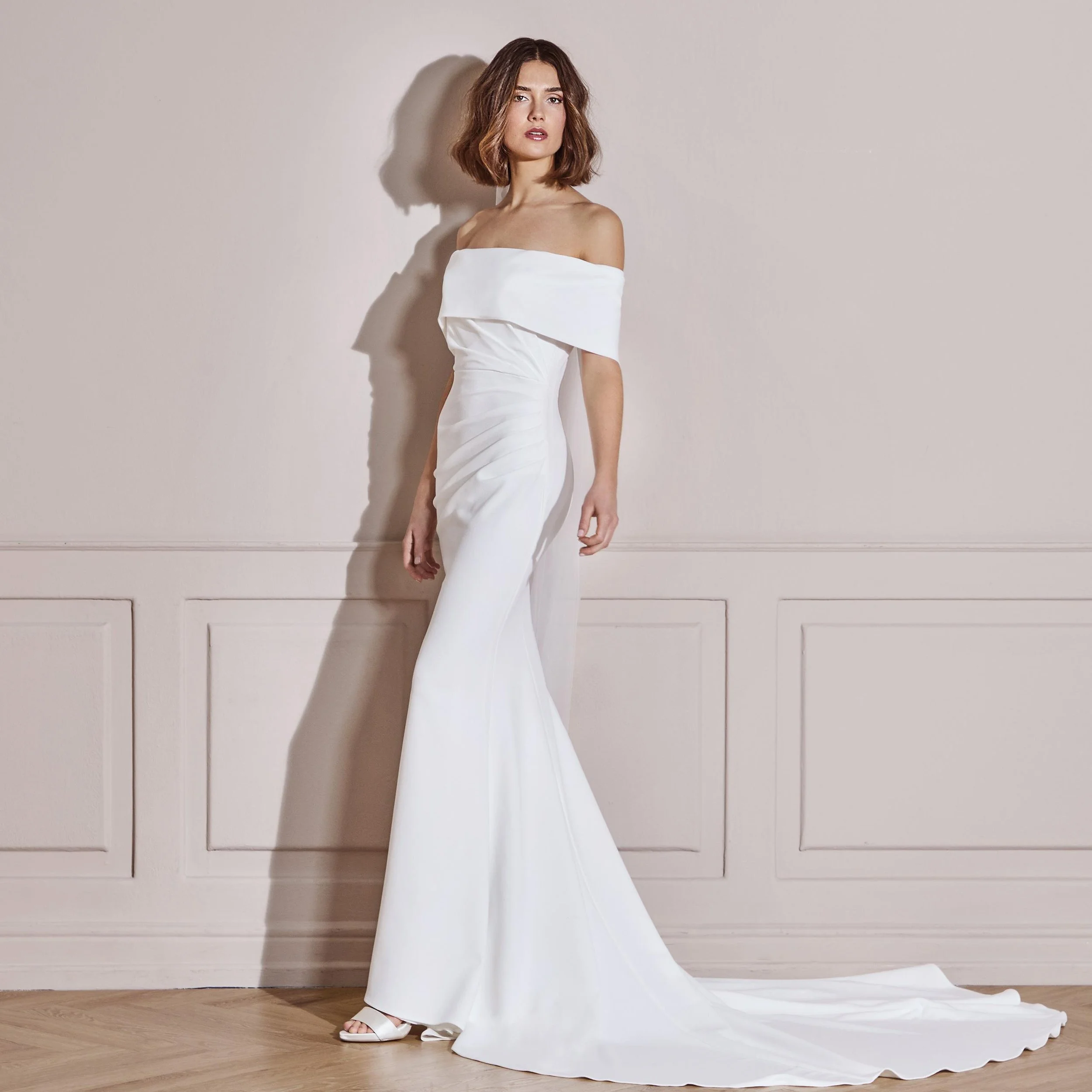 draped fitted wedding dress