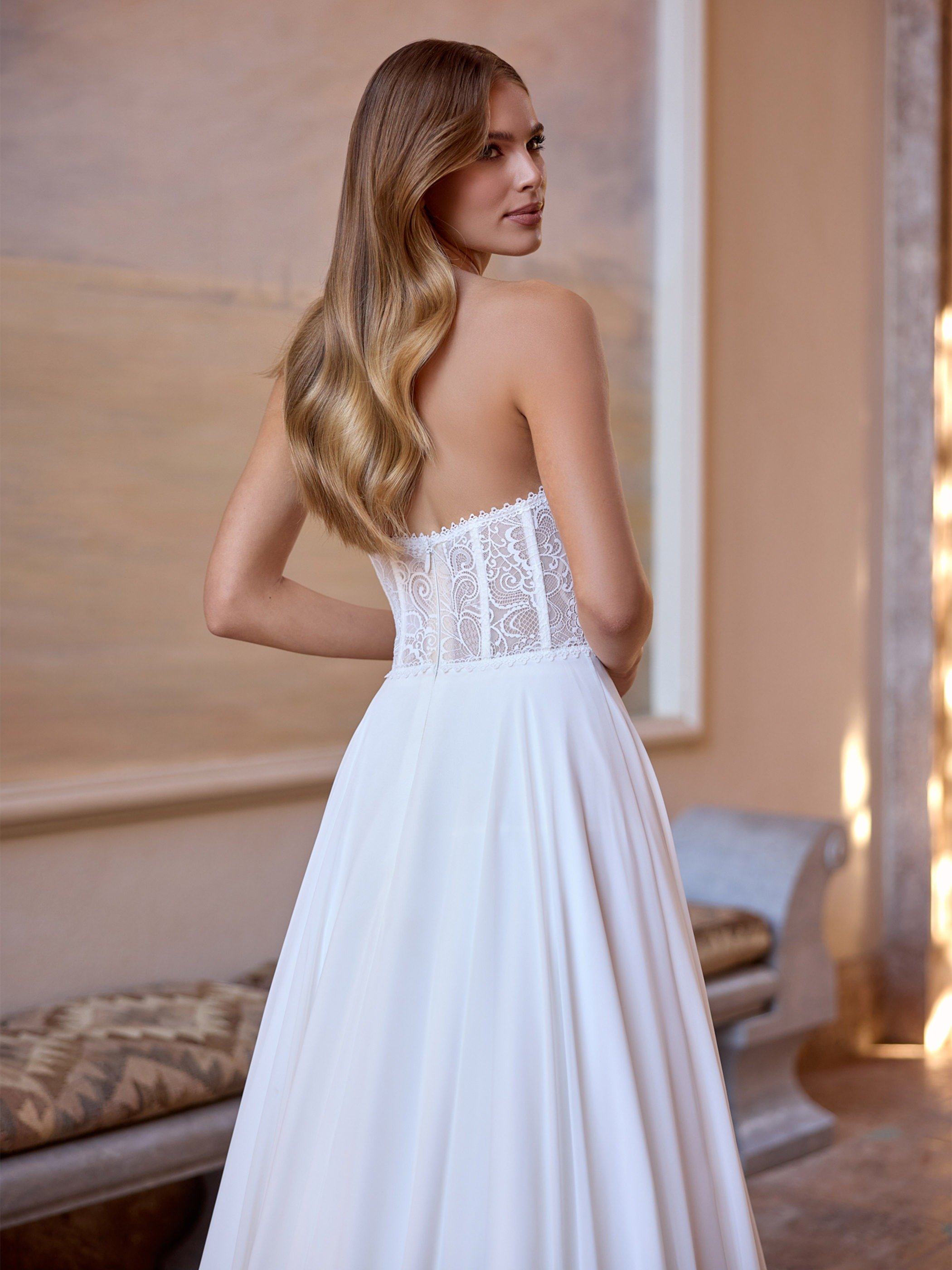 Strapless lace top wedding dress with flowy skirt 2026 2027 stockholm Sublime