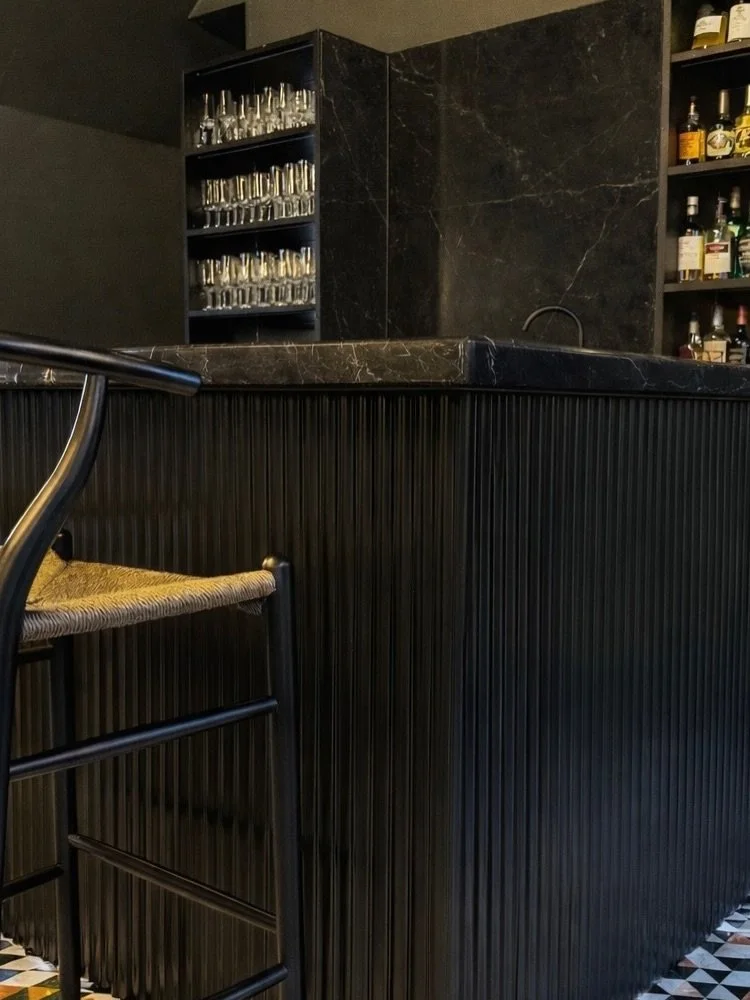 iPhone snaps from this dark and moody home bar from a past project is giving us all the feels! The custom marble mosaic and bespoke Love chandelier are absolute showstoppers

#interiordesign #love #bar #design