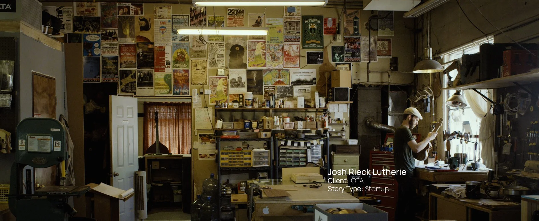Luthier Josh Rieck working in his instrument-making workshop, still from a Passenger Productions startup documentary