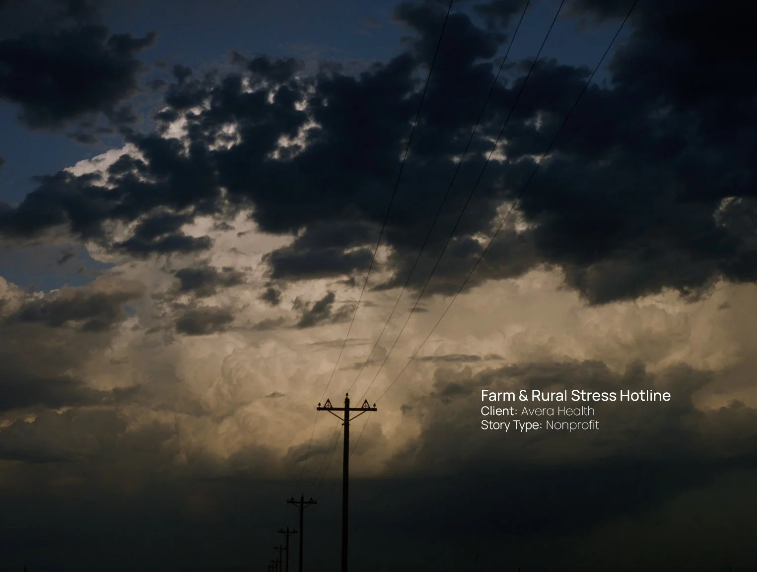 Storm clouds over a rural prairie landscape at dusk, still from a Passenger Productions nonprofit documentary for the Farm & Rural Stress Hotline and Avera Health