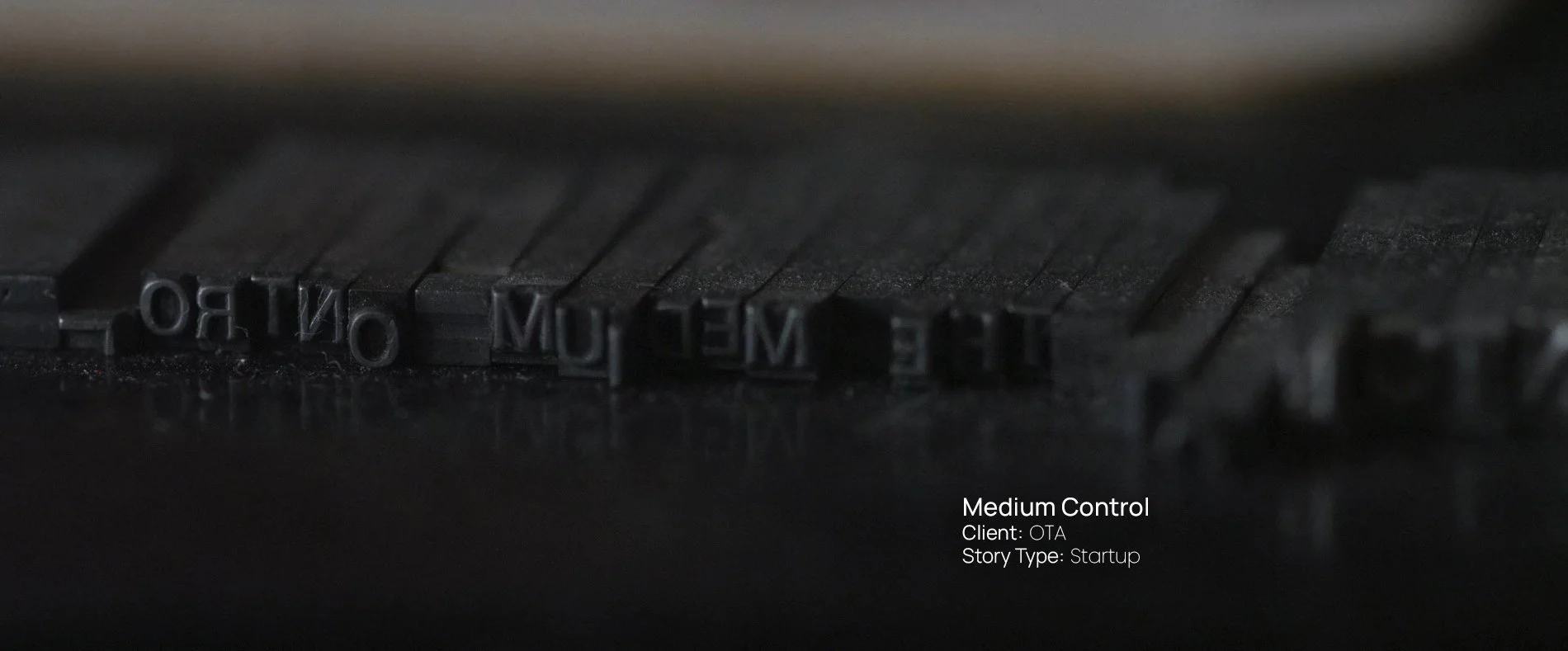 Close-up of vintage letterpress type spelling "the medium," still from a Passenger Productions startup documentary about Medium Control