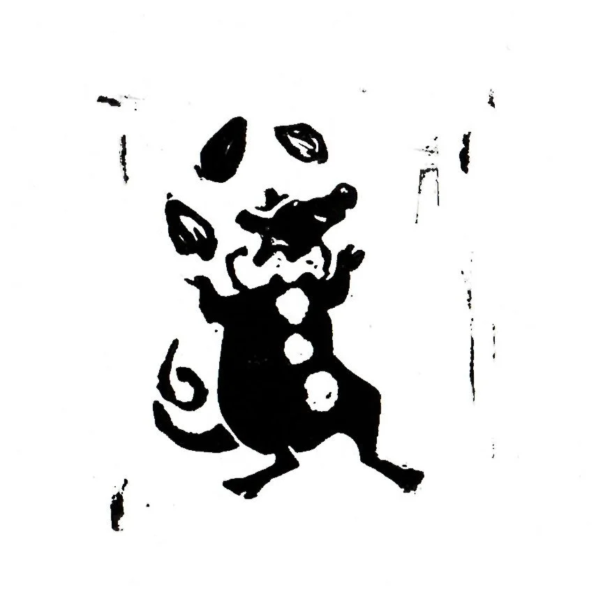Rat Pack: When the Circus Came to Town, 2 inch Linocut Print
Description: A rat dressed as a clown with a ruffled collar, pom pom buttons, a big nose, and a little hat, juggles three sunflower seeds