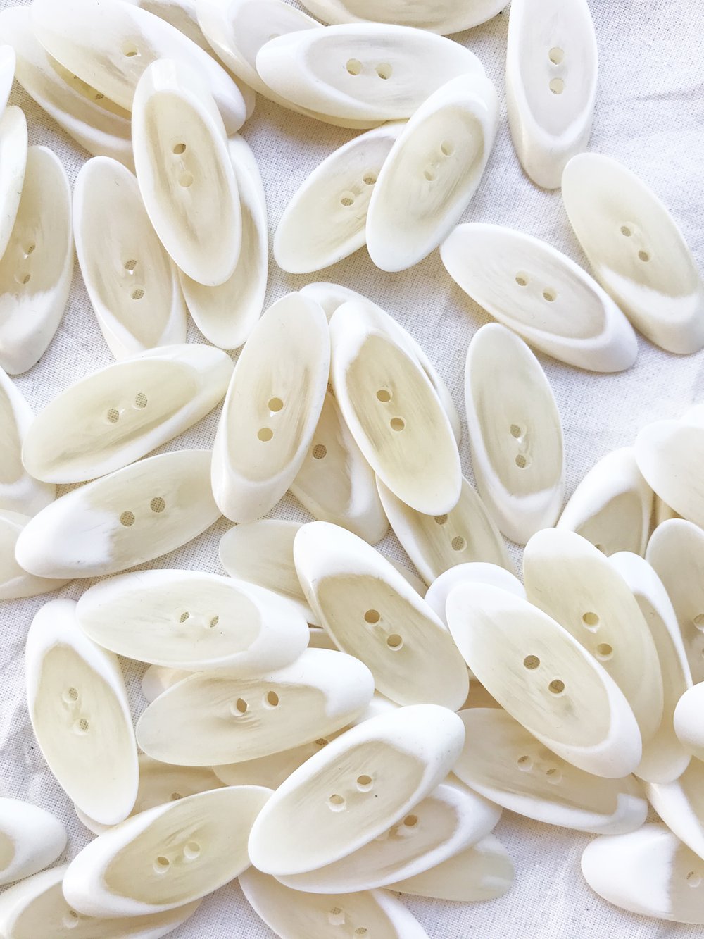 6 ct Julienne Ivory Poly Coat Buttons — L'Etoffe Fabrics Online