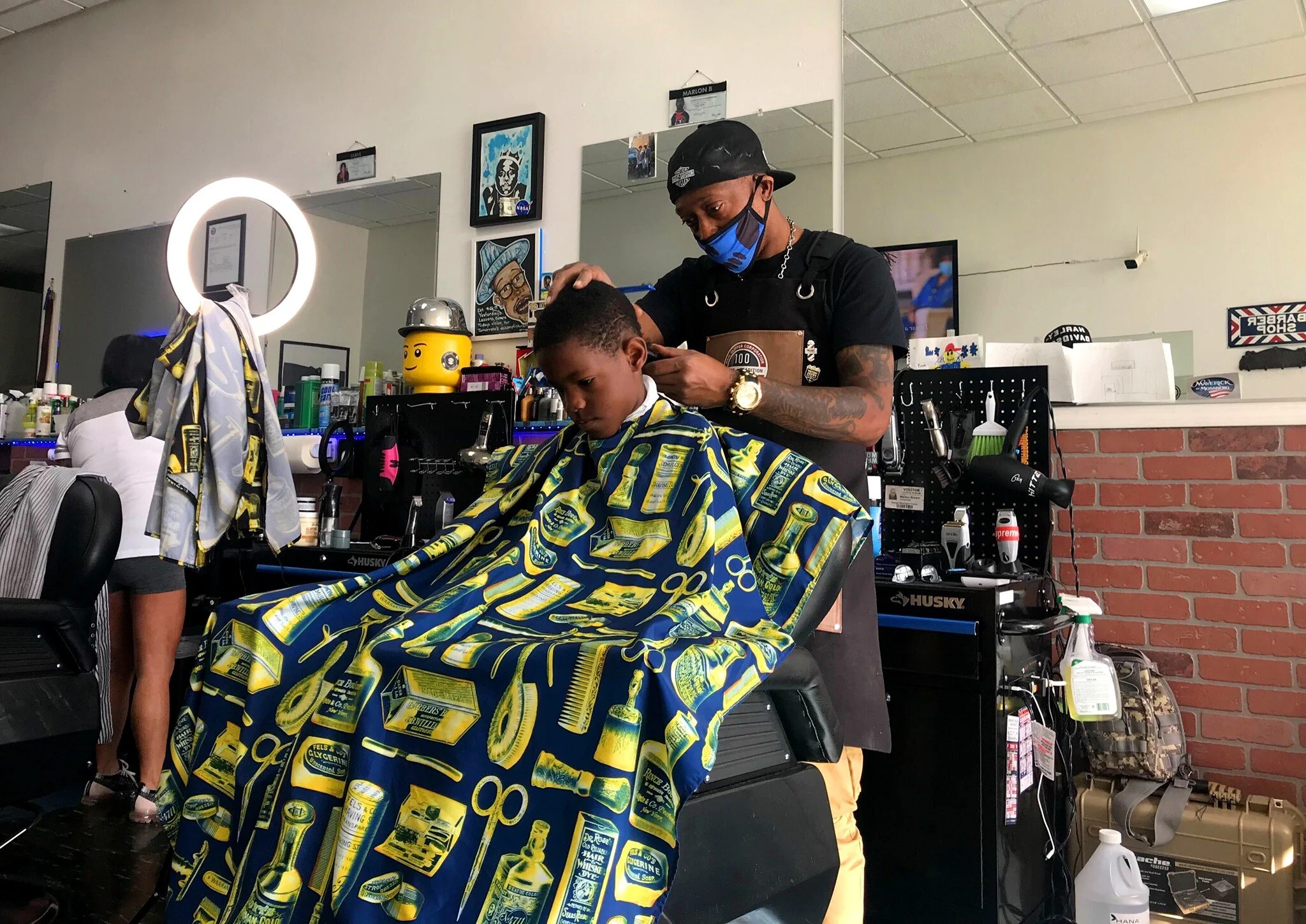 It is not just a barbershop, it’s a hub for action.