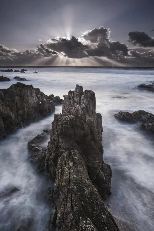 Cathedral of Stone: Sunlight Pierces the Pacific