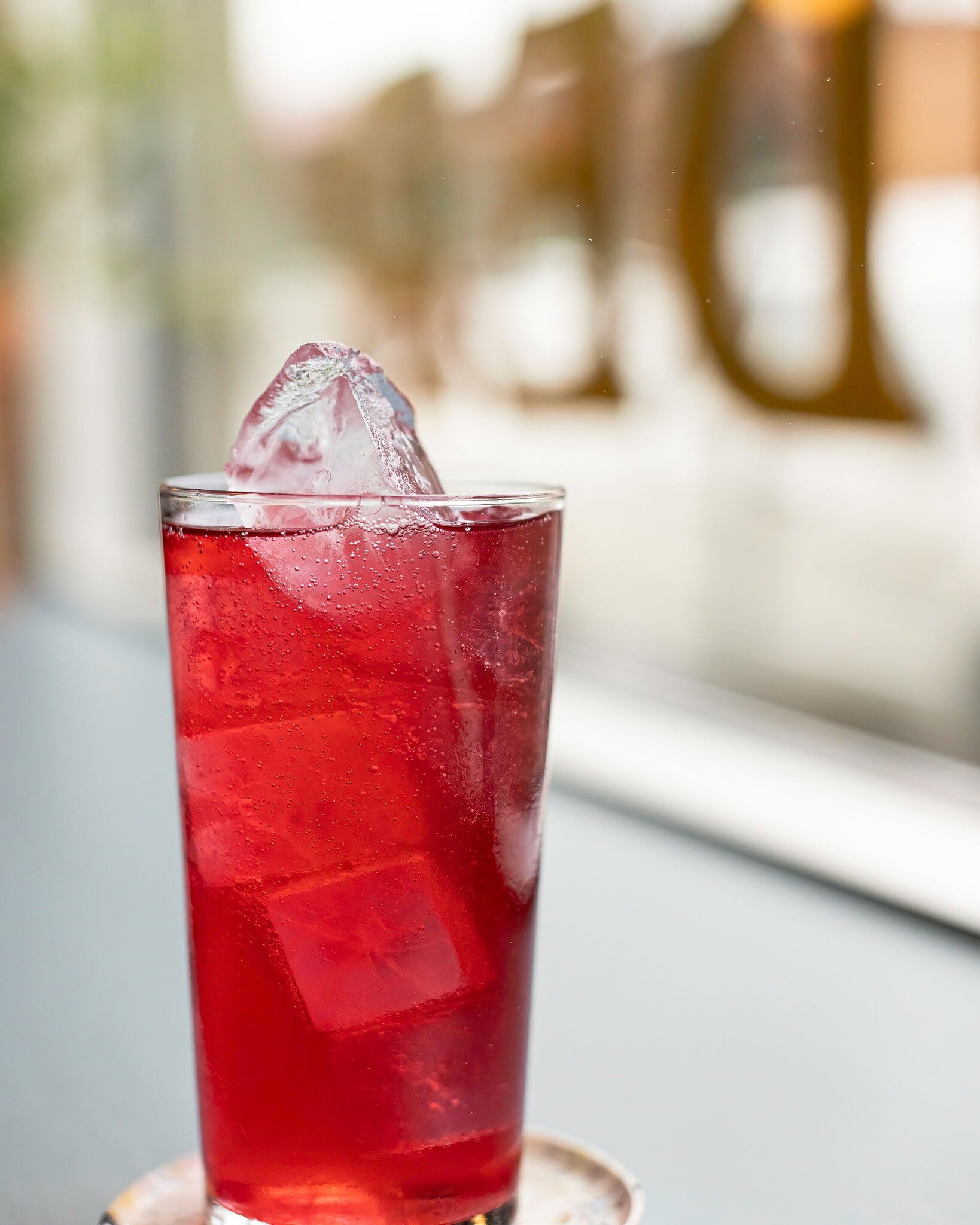 We make drinks to delight + satisfy, including non-alcoholic ones like our always-on-the-menu ROSELLE (0% abv) made with hibiscus, lemon, and spices. 

Our goal with the ROSELLE is to capture the fresh, sweet-sour flavors of hibiscus in a refreshing,