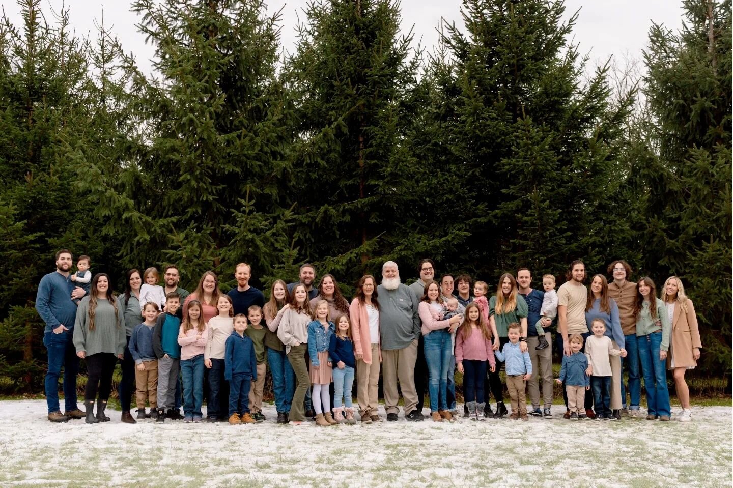 I don't know if I have ever shot an extended family session larger than my own. This photo was taken over Christmas Break in Upstate NY with my parents, my 8 siblings and their families.  Coordinating 42 people in cold temperatures and busy schedules