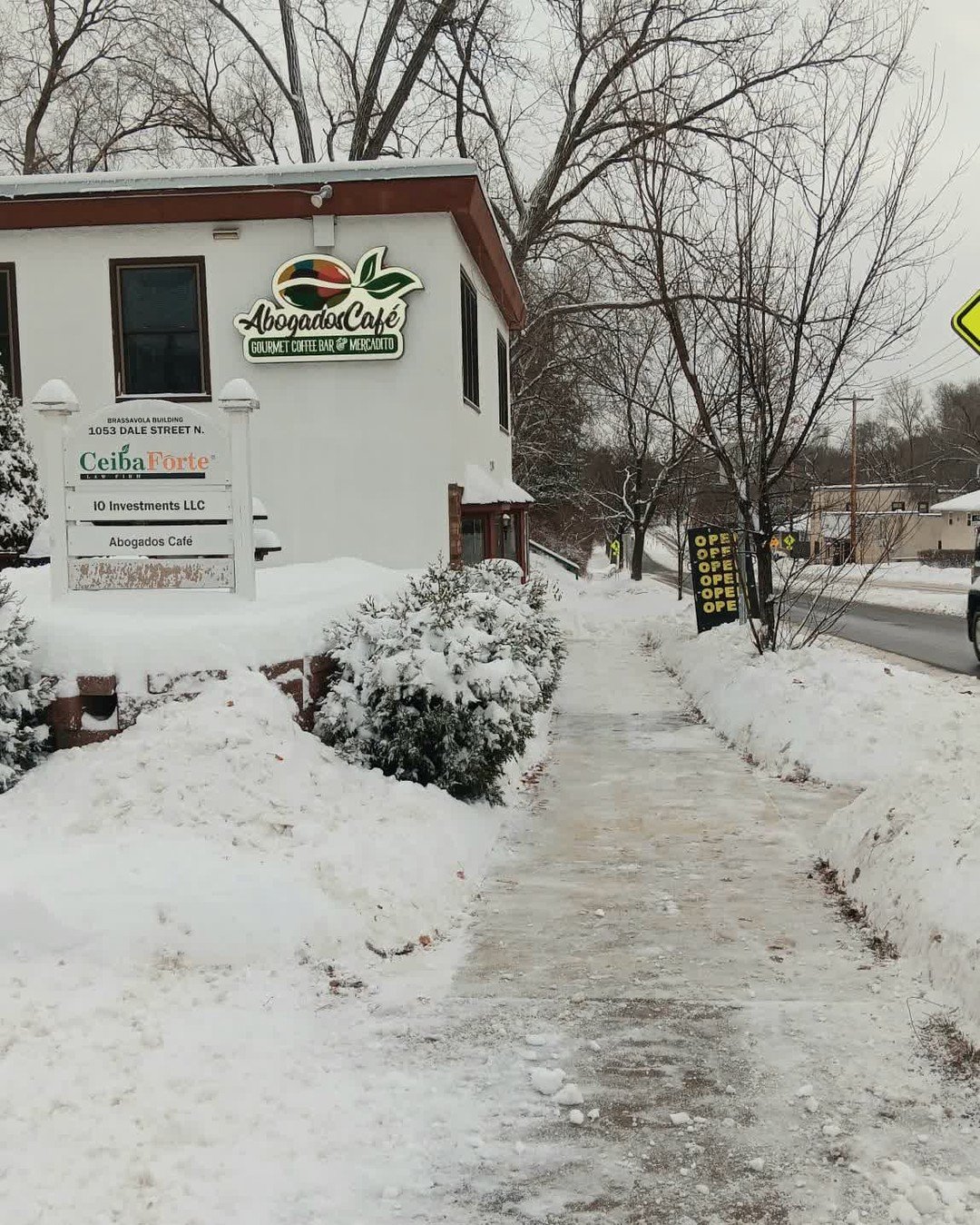 Snow may be piling up, pero aqu&iacute; estamos &mdash; we cleared a path just for you and your morning cafecito. 🤎❄️☕

#minnesota #snow #december #coffee #coffeeshop #coffeepath #cafecito