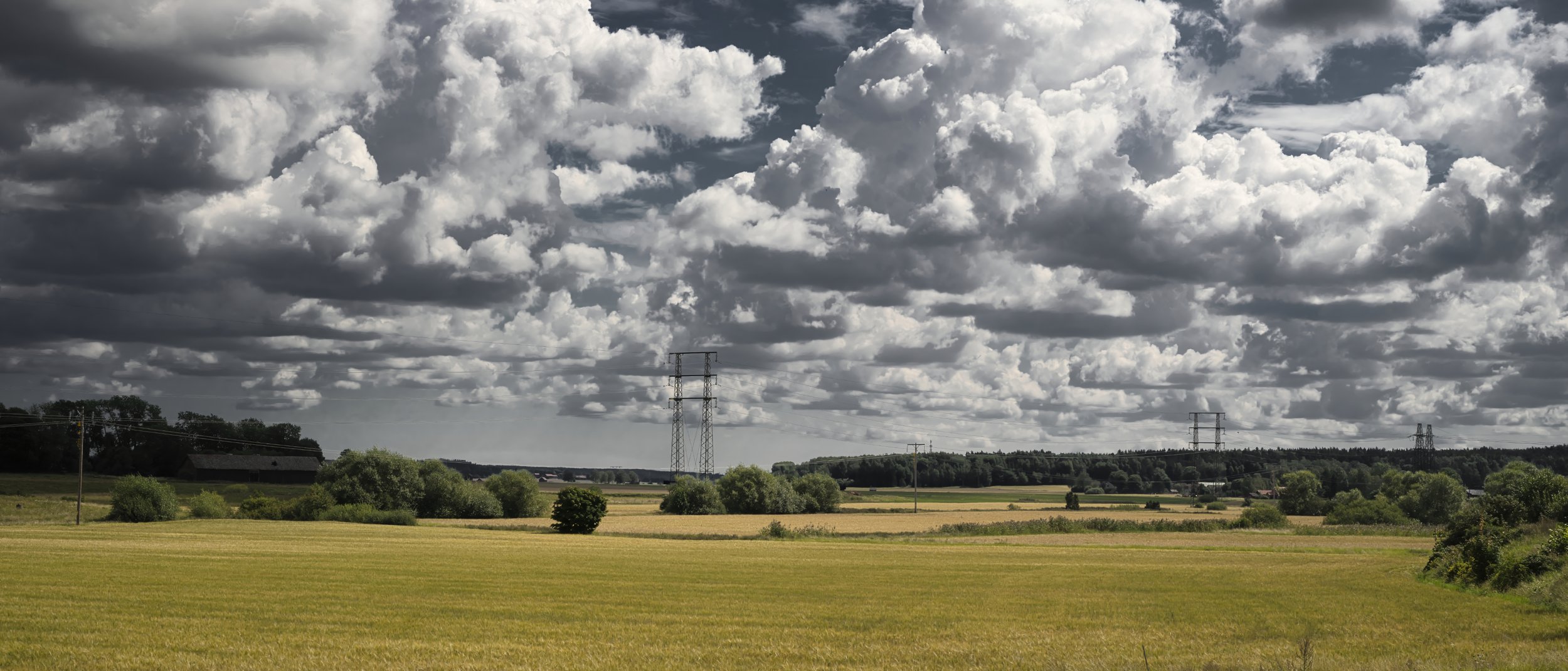 B0029311 Field Power lines Clouds