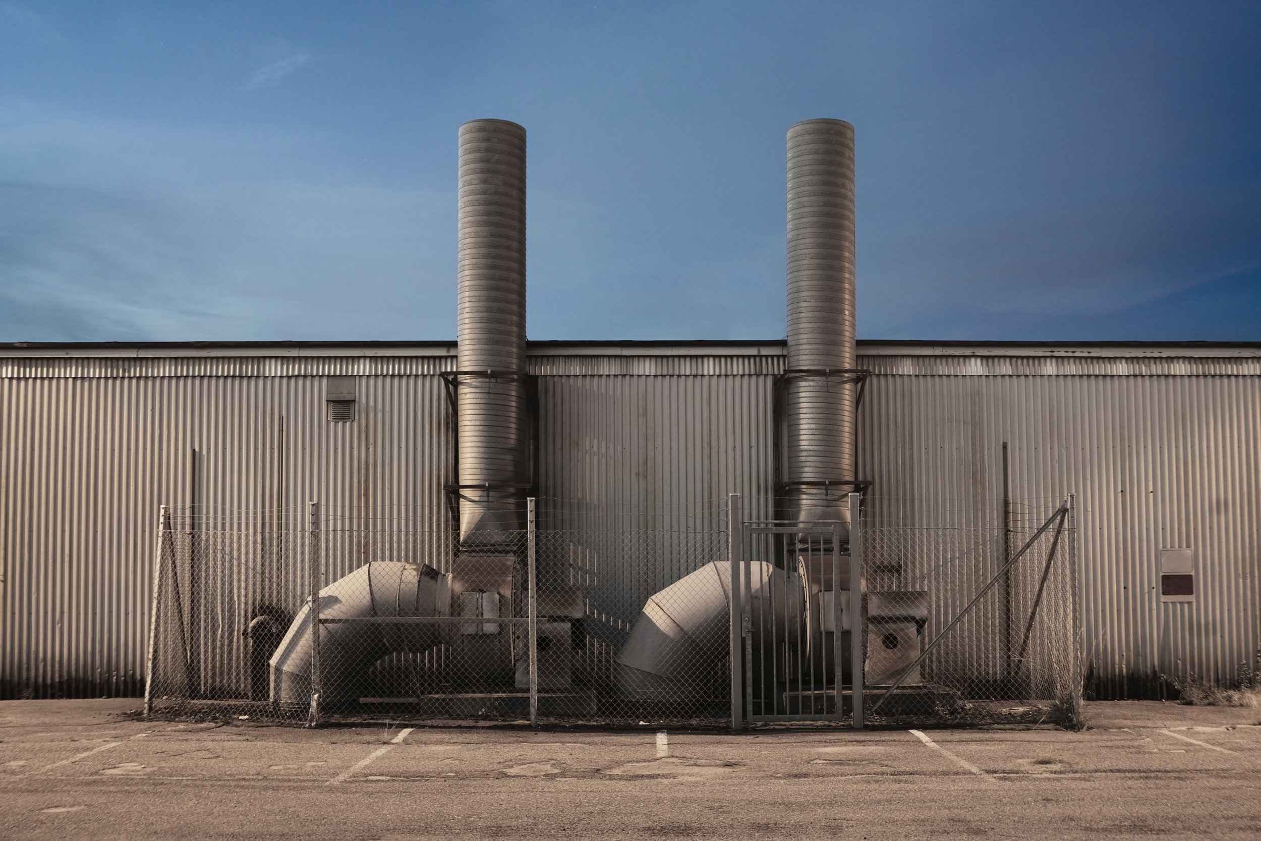 B0013549 Twin Pipes Sheet Metal Wall Blue sky