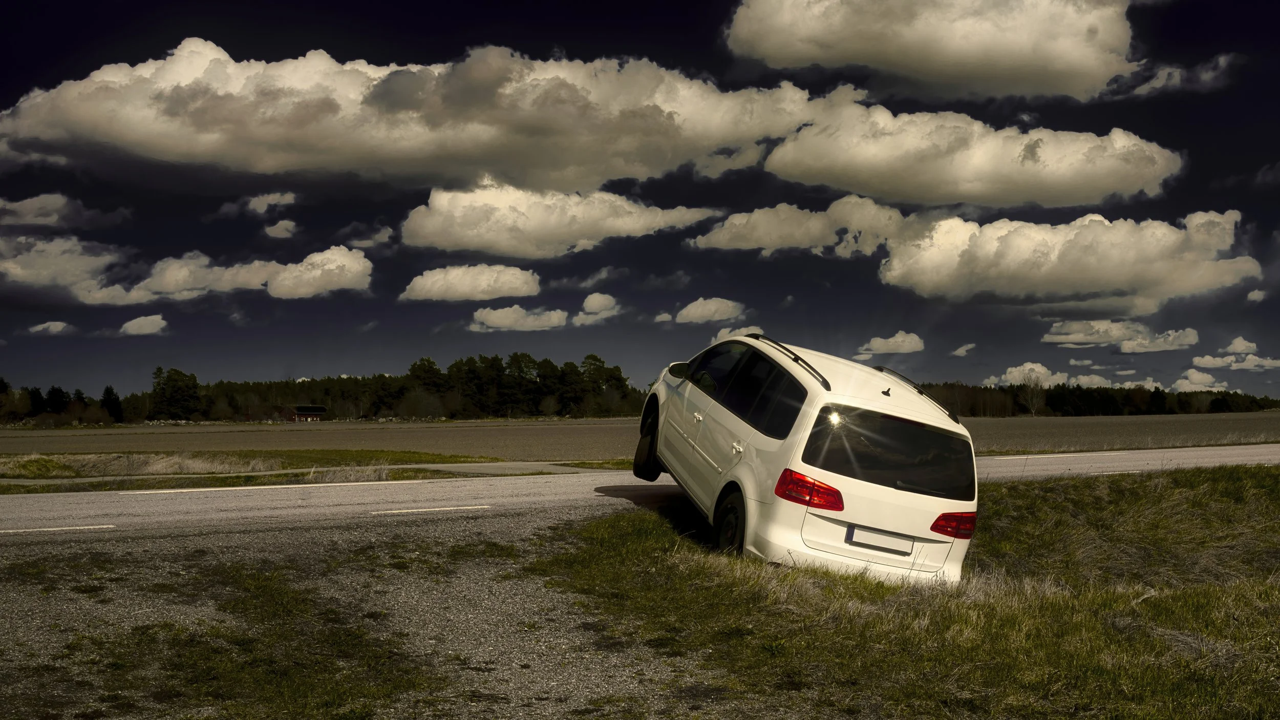 B0004361 White Car and Clouds