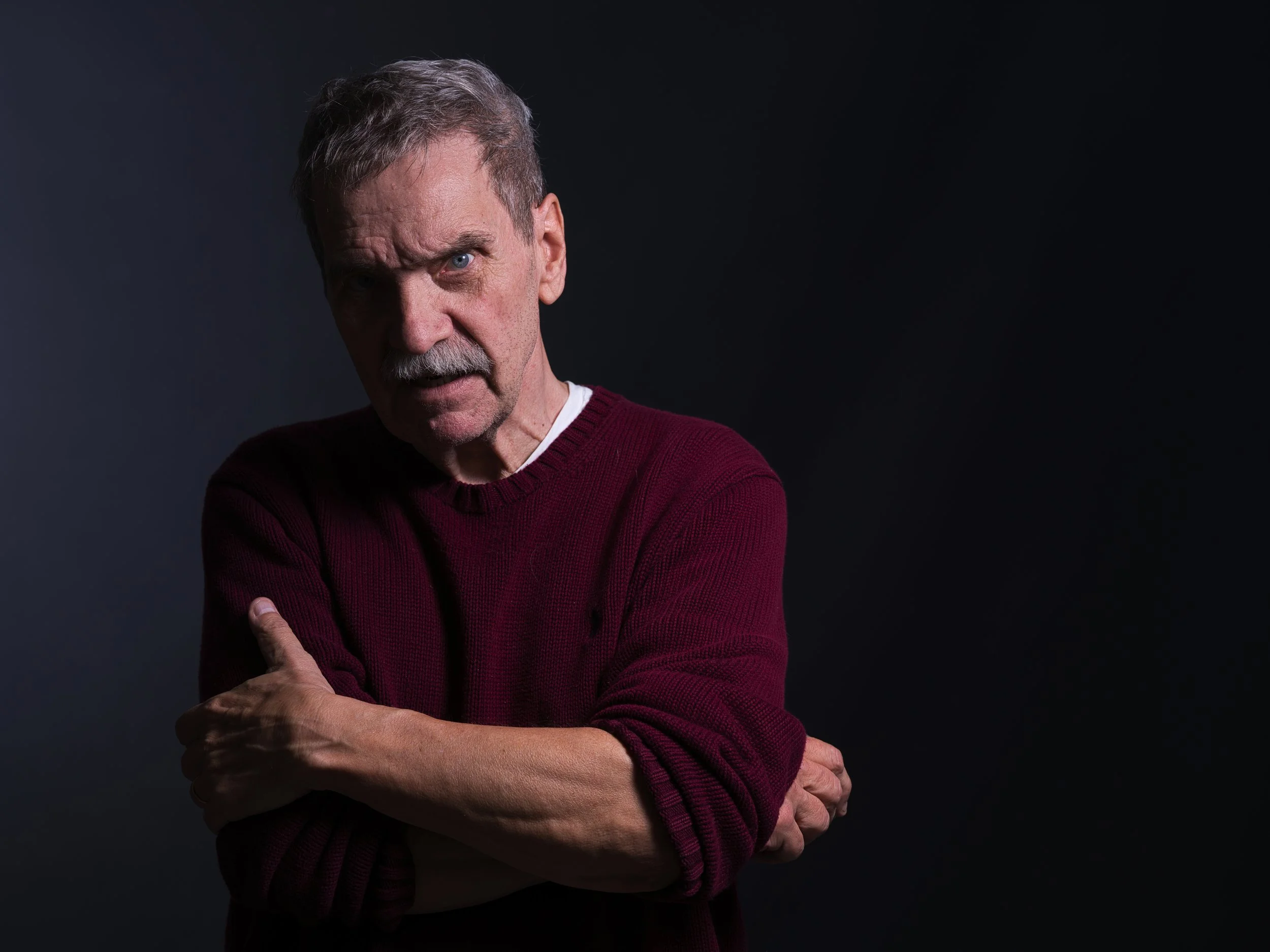 B0015710 Man with Arms Crossed